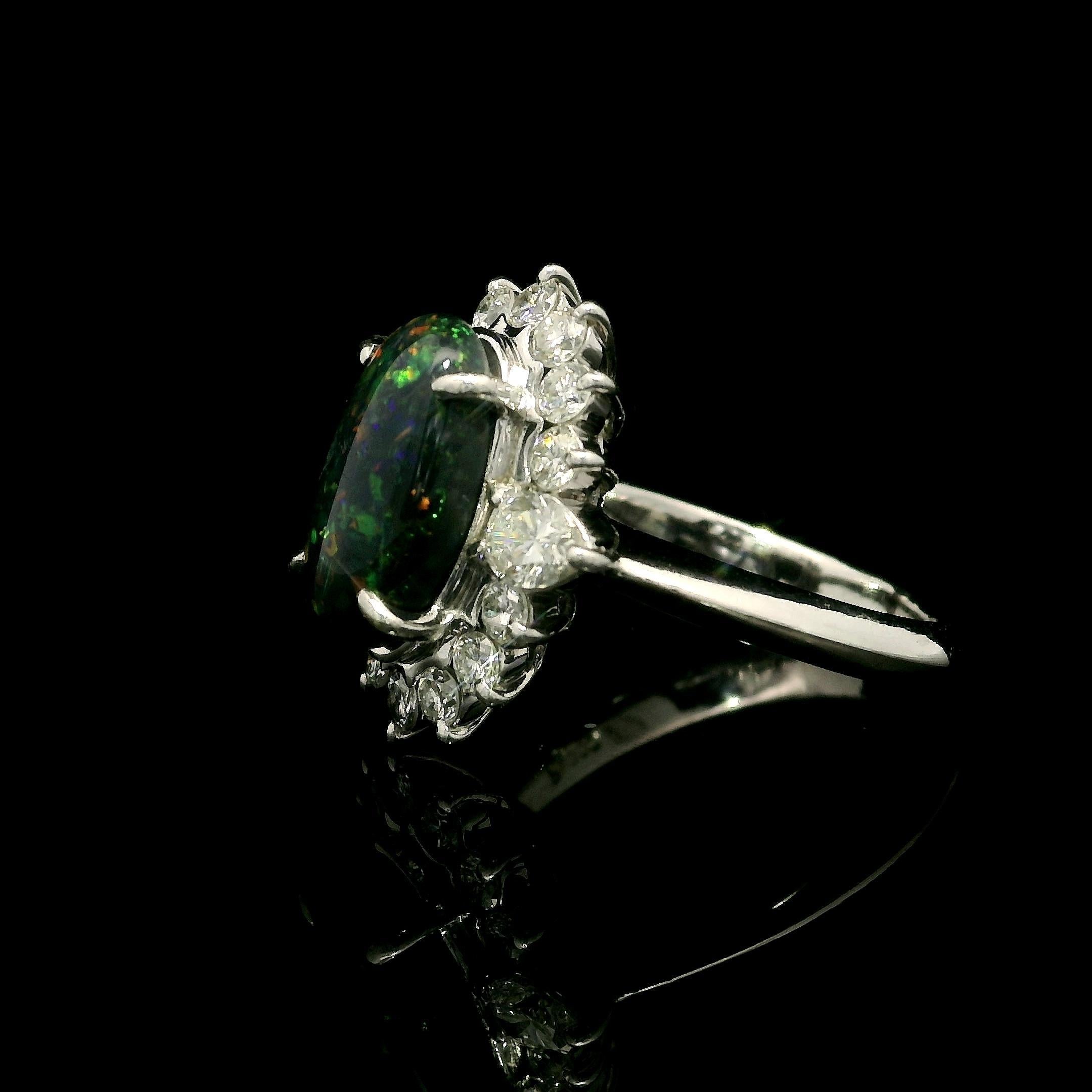 Cabochon Platinum 3.65ctw GIA Elongated Oval Black Opal w/ Diamond Halo Nice Shape Ring For Sale