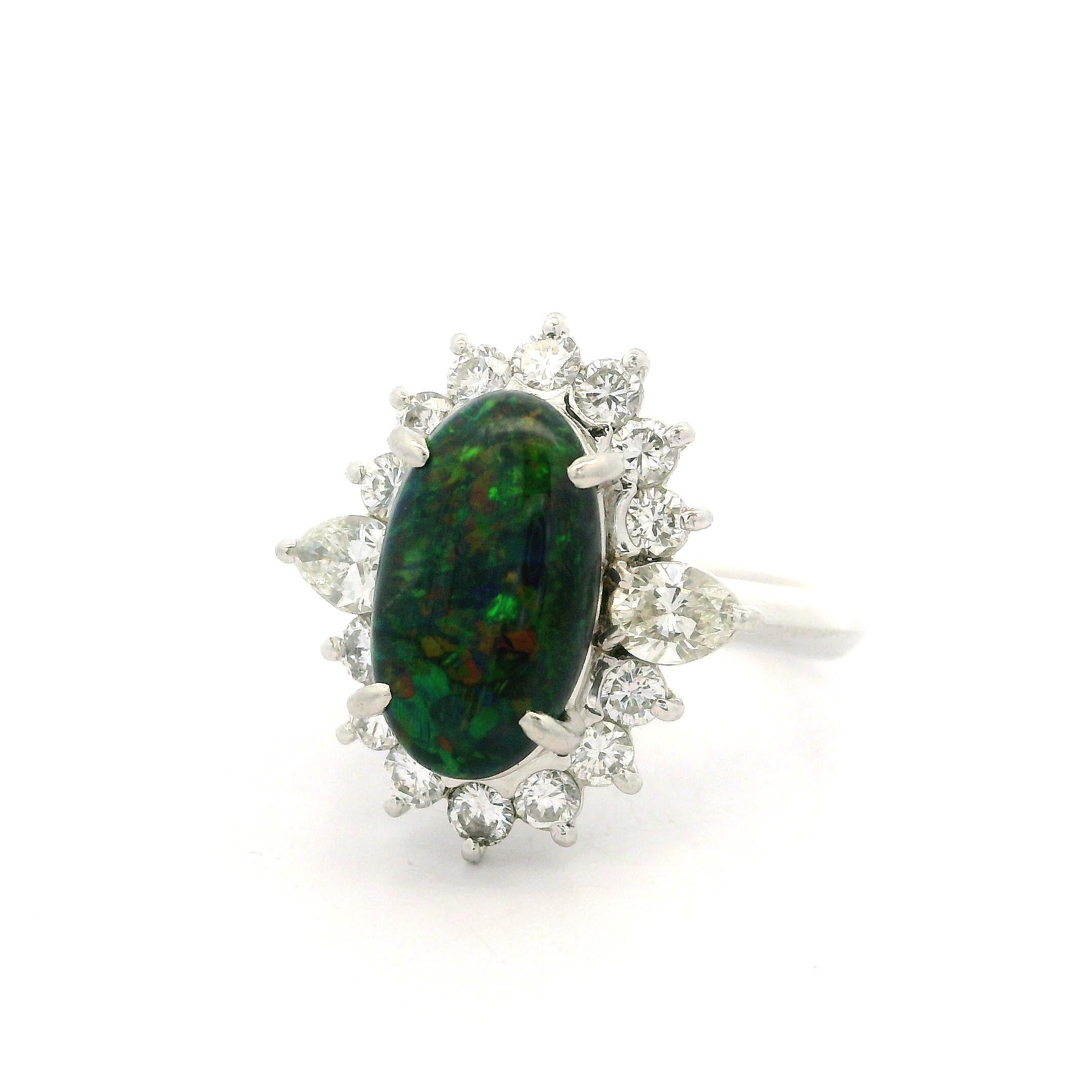Platinum 3.65ctw GIA Elongated Oval Black Opal w/ Diamond Halo Nice Shape Ring For Sale 3
