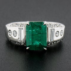 Platinum 3.67ctw GIA Octagonal Green Emerald w/ Baguette & Round Diamond Ring