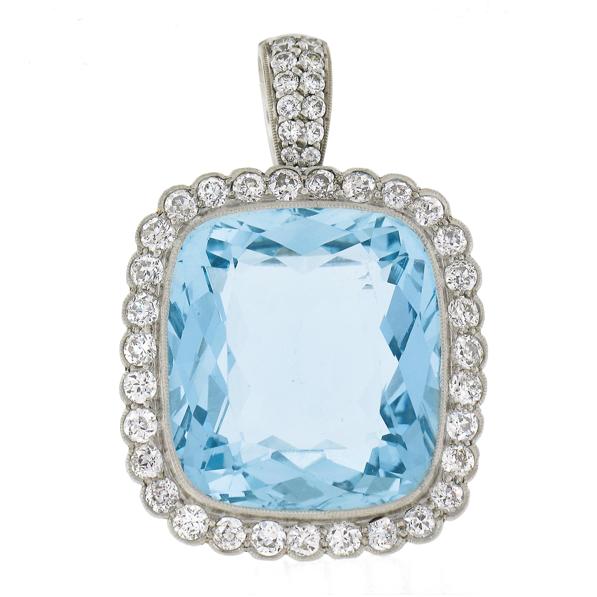 Magnificent perfectly bezel set aquamarine in platinum (Very hard to do) with fiery old cut diamond frame. At some point after a bail was custom made for this piece for wear as a pendant. Special Heirloom piece! Enjoy!

--Stone(s):--
(1) Natural