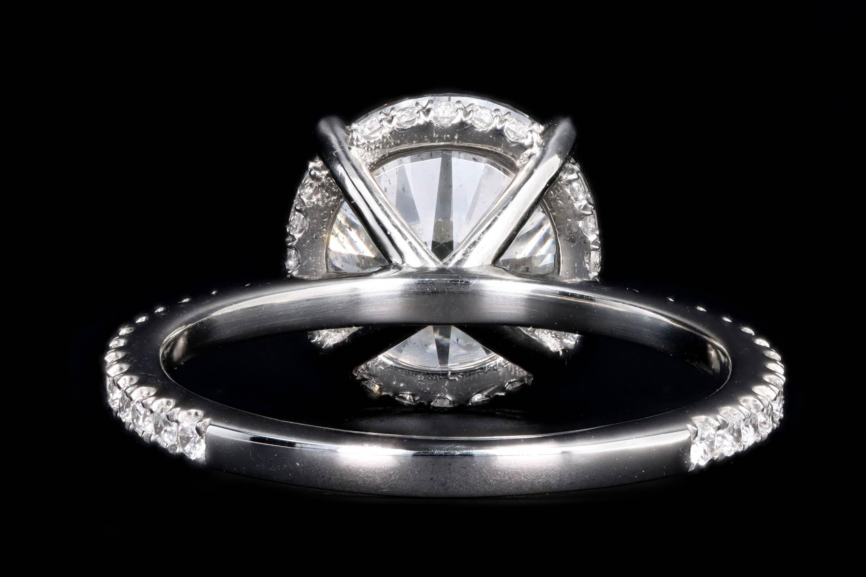 Platinum 3.92 Carat Round Brilliant Diamond French Halo Engagement Ring 1