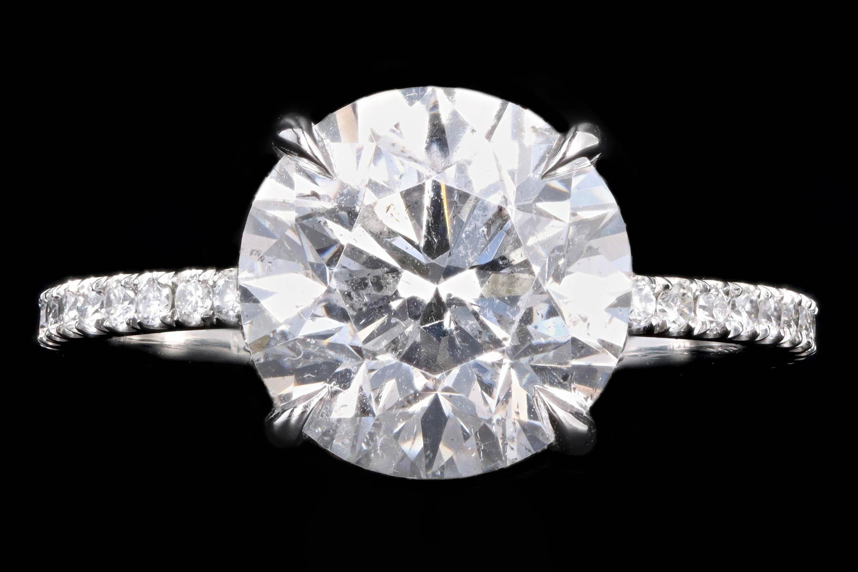 Platinum 3.92 Carat Round Brilliant Diamond French Halo Engagement Ring 2