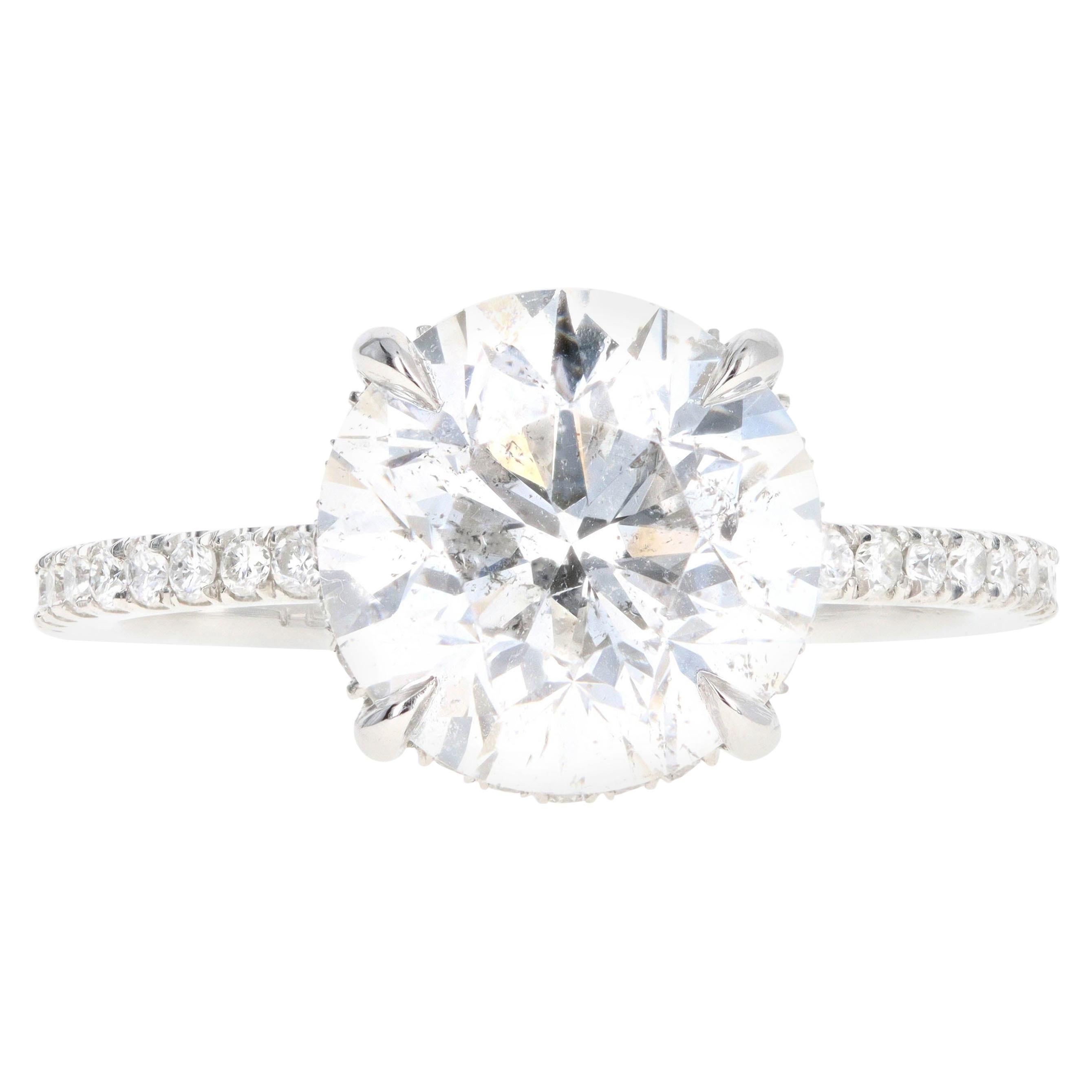 Platinum 3.92 Carat Round Brilliant Diamond French Halo Engagement Ring