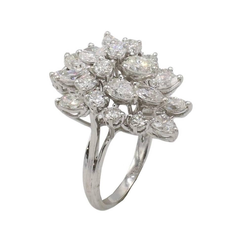 Platinum 4.00 Carat Natural Diamond Cluster Waterfall Cocktail Ring 
Metal: Platinum
Diamonds: Approx. 4.00 CTW natural marquise, round and oval diamonds F-G VS
Top: 16.5 x 27mm
Height:: 14mm
Size: 6 (US)
Weight: 7.28 grams