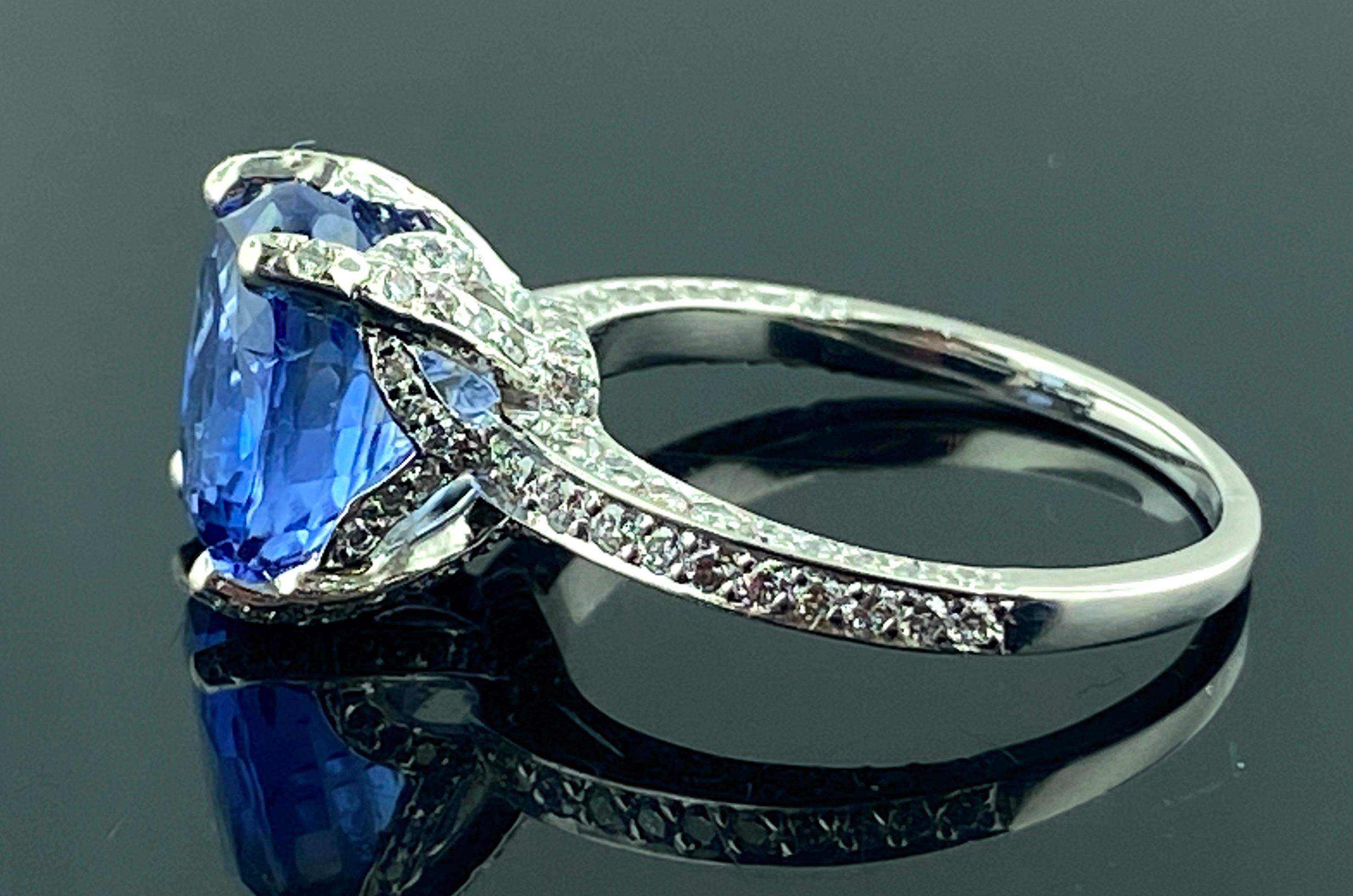 Oval Cut Platinum 4.06 Carat Blue Sapphire and Diamond Ring For Sale