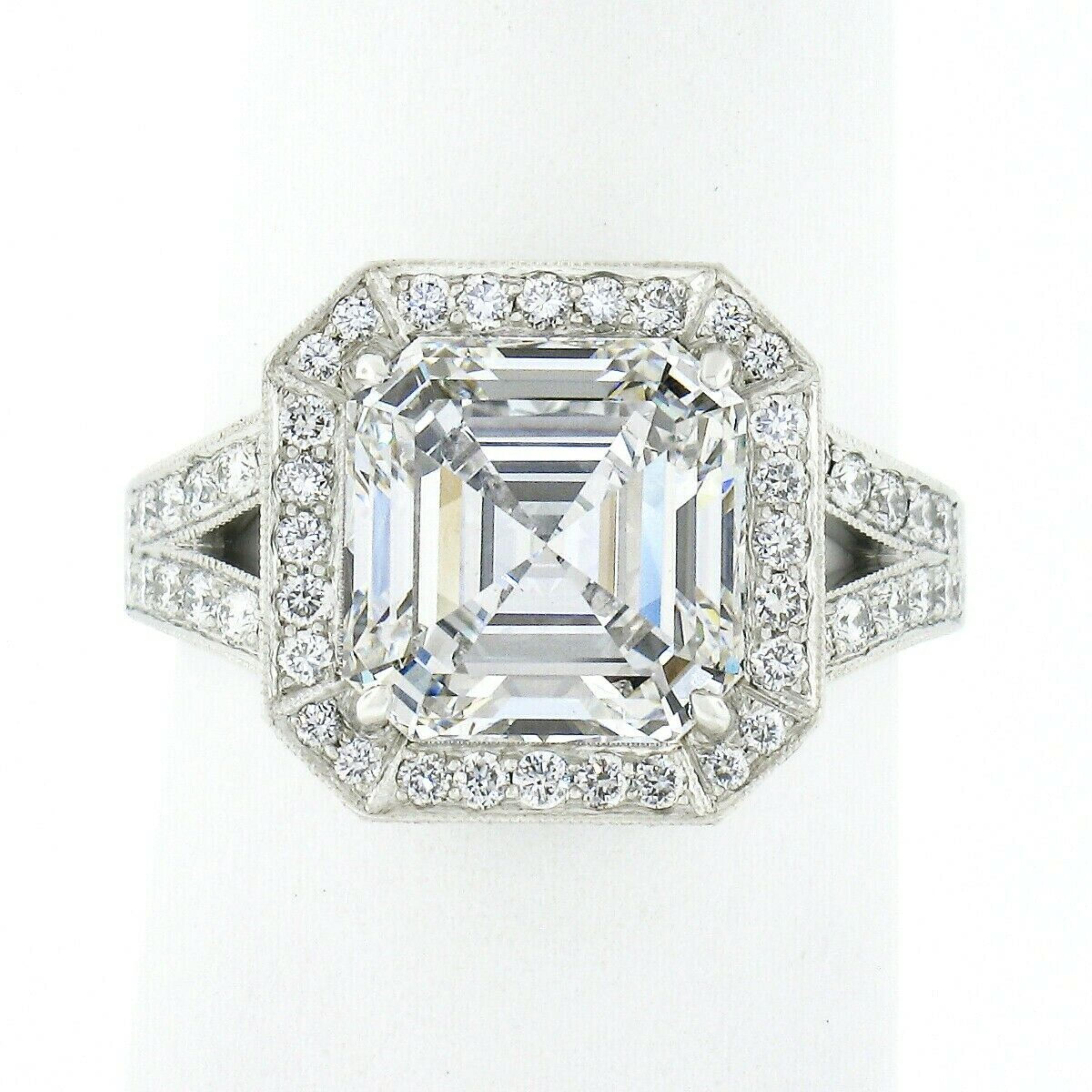 This elegant and fancy diamond engagement ring was designed by William Goldberg and crafted in solid platinum. It features a large, 3.10 carats GIA certified center diamond that is absolutely spectacular and showcases magnificent amount of sparkle