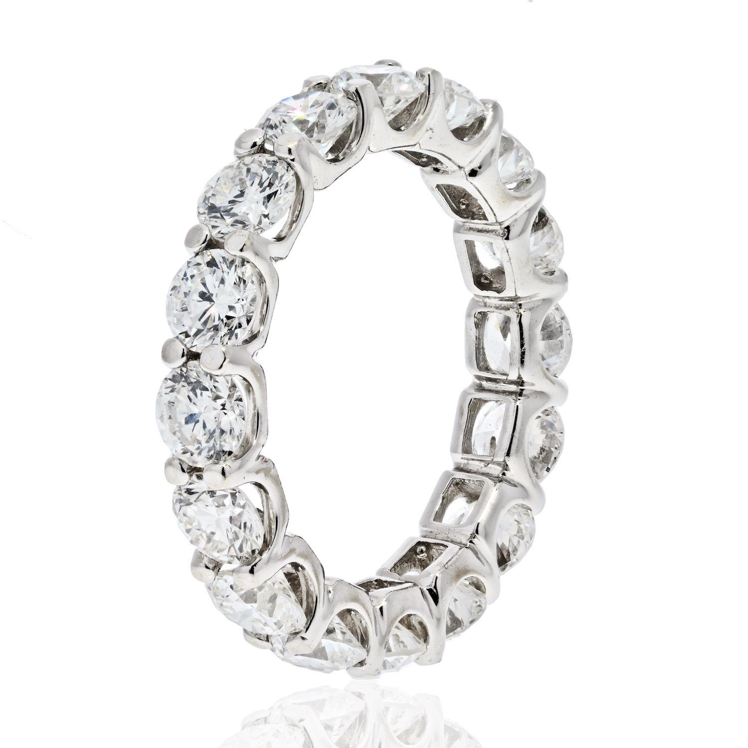 Platinum diamond eternity band mounted with round cut diamonds of  4.11cttw total weight. There are 16 diamonds in total. Which means each is about 0.25ct (quarter carat) each.  U-shaped shared prong setting. Average diamond quality G-H color, VS-SI