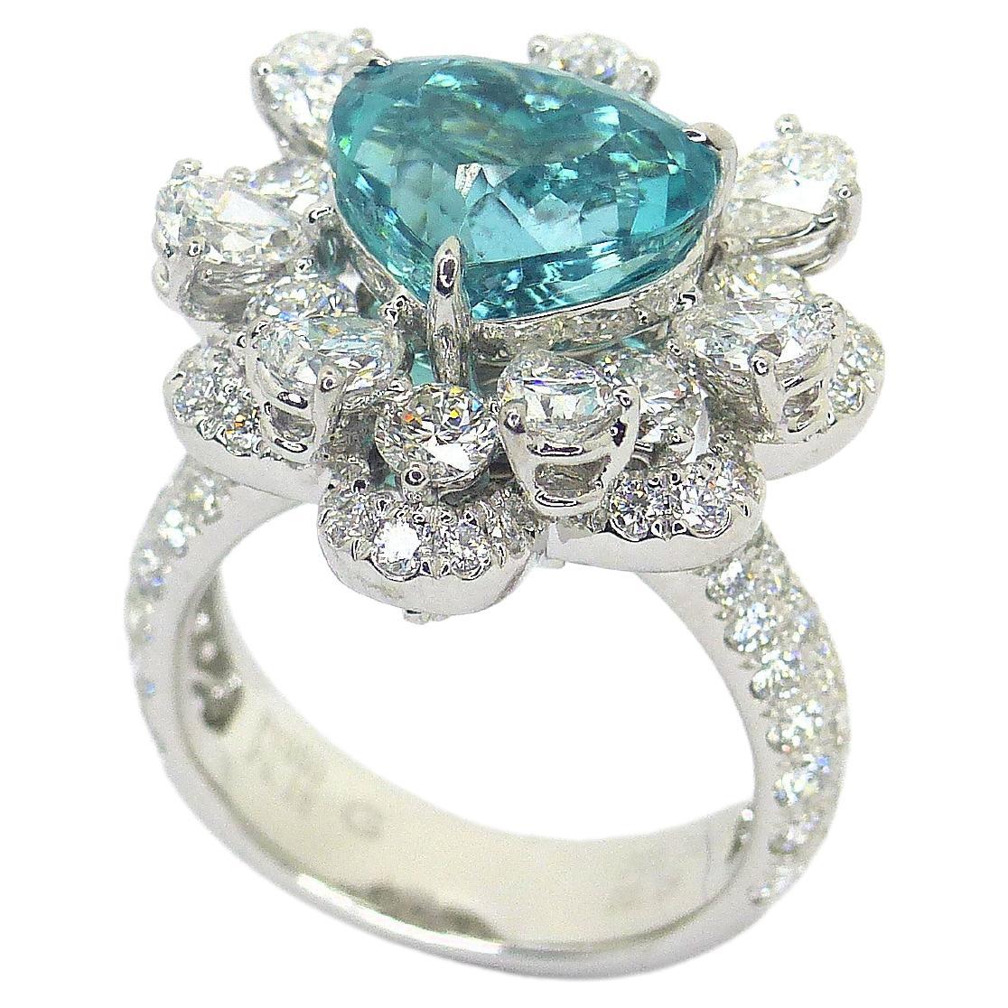 Ring in Platinum with 1 blue/green Paraiba Tourmaline Heartshape and Diamonds For Sale