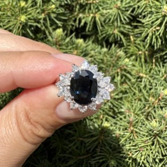 Platinum 4.21ctw Dark Blue Sapphire Round Marquise Diamond Flower Cluster Ring