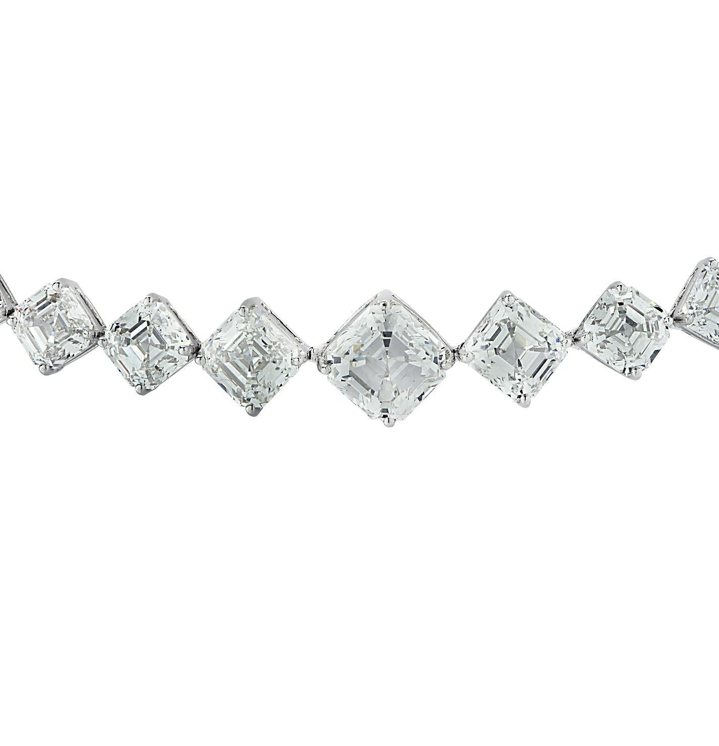 Spectacular Asscher Cut Diamond Riviere necklace crafted in platinum, featuring 65 asscher cut diamonds weighing approximately 42.47 carats total, G-H color, VS clarity. The diamonds are set on the diagonal, graduating in size, culminating in a GIA