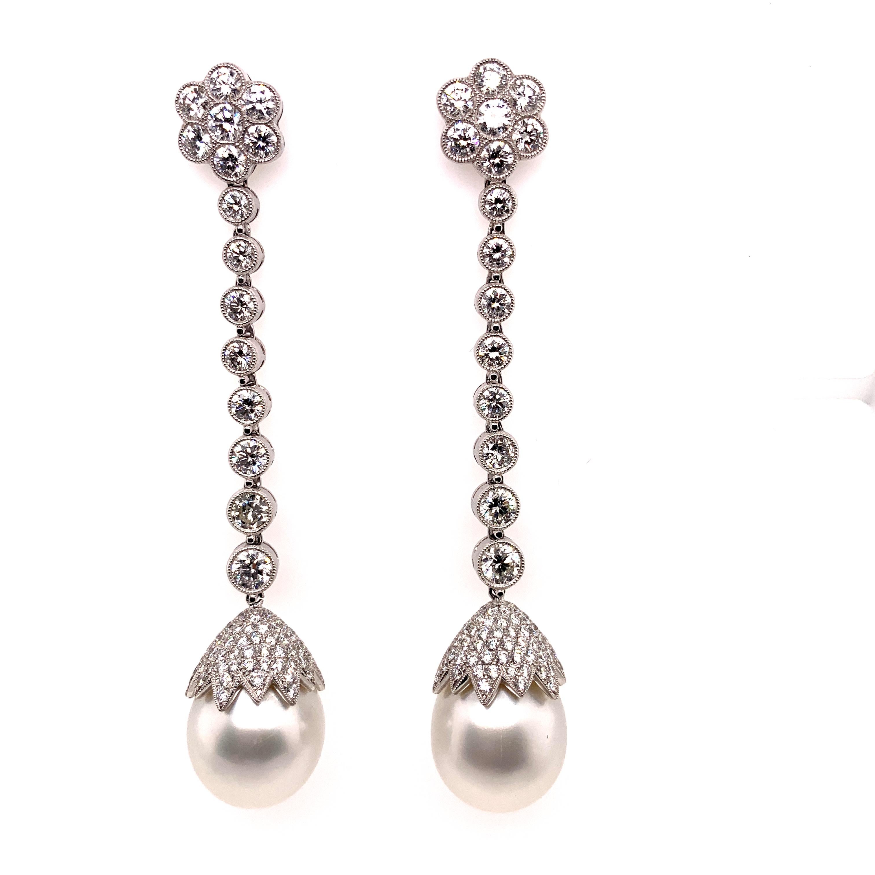 Drop earrings set in platinum with 4.27 carats of diamonds and white pearls.

Sophia D by Joseph Dardashti LTD has been known worldwide for 35 years and are inspired by classic Art Deco design that merges with modern manufacturing techniques.       