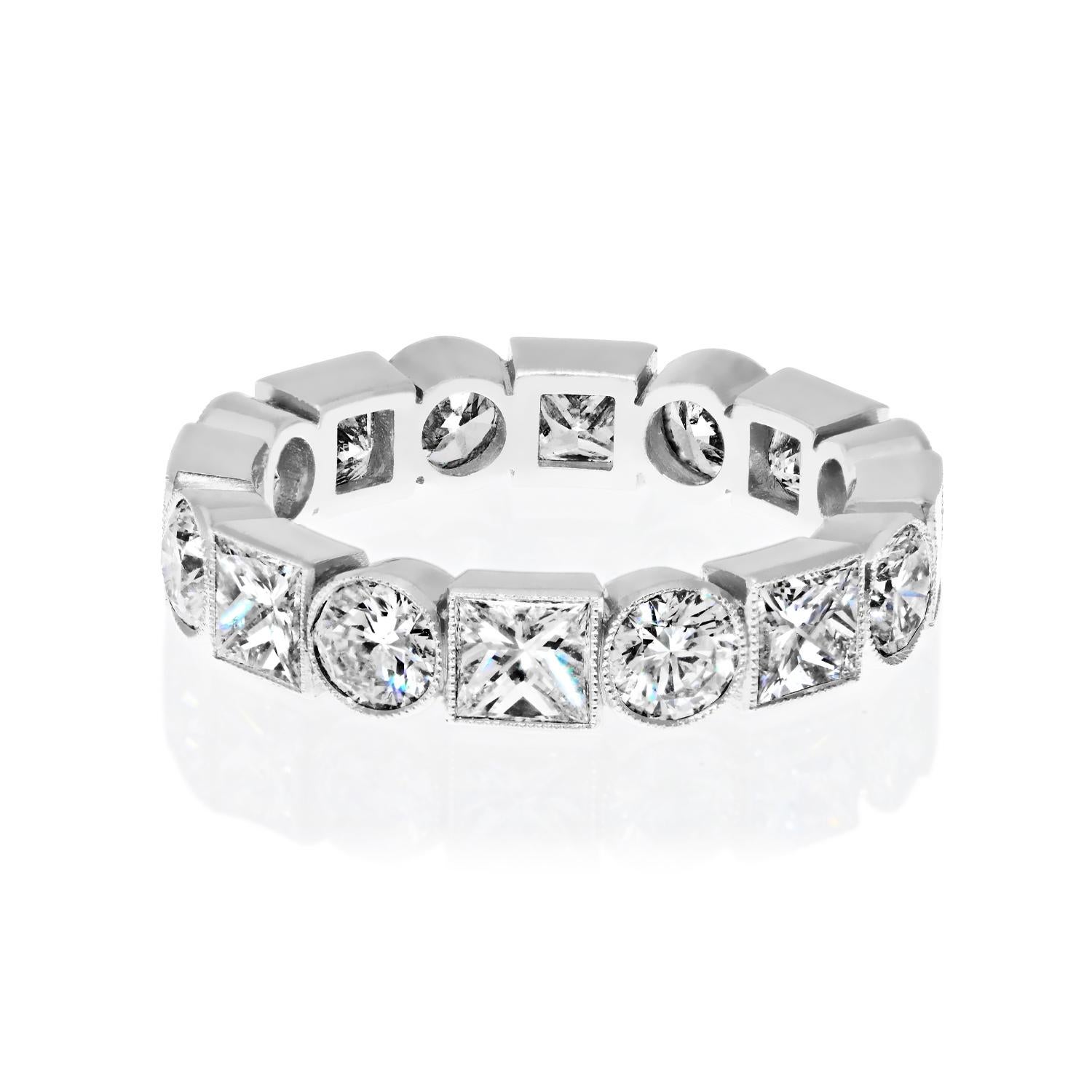 This platinum diamond eternity band is an exquisite piece of jewelry that will captivate anyone's attention. The alternating pattern of princess and round cut diamonds gives the ring a unique and sophisticated look.

All of the diamonds are bezel