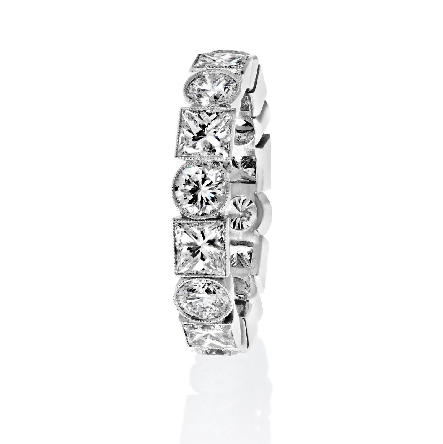 Contemporary Platinum 4.50cttw Bezel Set Round And Princess Cut Diamond Eternity Ring For Sale
