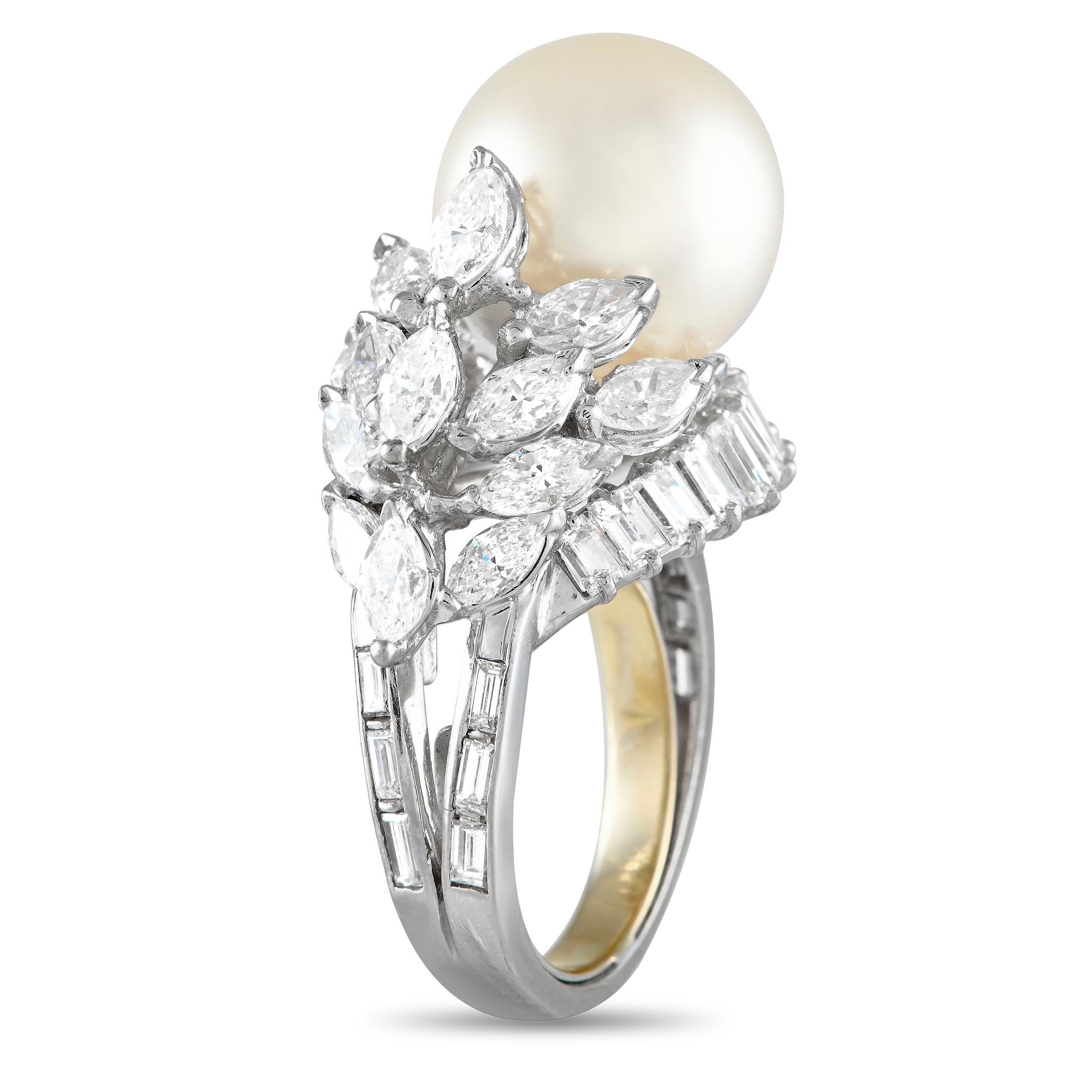 On this exquisite ring, a 14.7mm Pearl serves as a stunning focal point. The intricate Platinum setting also comes complete with an array of sparkling Diamond totaling 4.65 carats. Elegant and opulent, this piece features a 4mm wide band and a