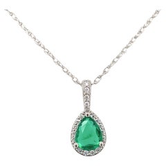 Platinum .46ct Pear shape Emerald & Diamond Halo Pendant with 18" platinum chain