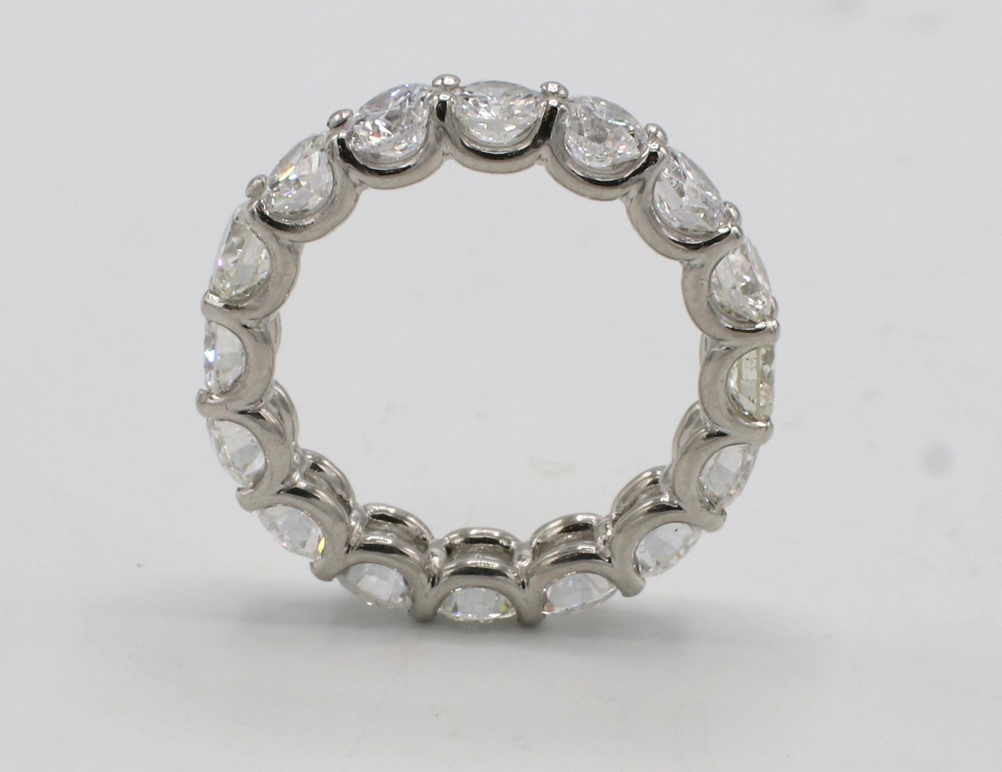Modern Platinum 4.88 Carat Round Natural Diamond Eternity Band Ring For Sale
