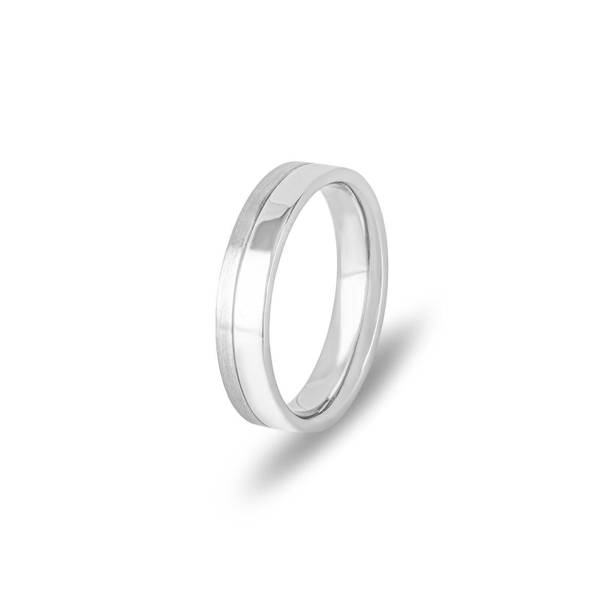 A chic platinum wedding band ring. The ring comprises of a 4mm wedding band in a flat court fit style. The ring has a gross weight of 6.90 grams and is currently a size UK M½ - EU 53 but can be adjusted for the perfect fit.

Comes complete with a