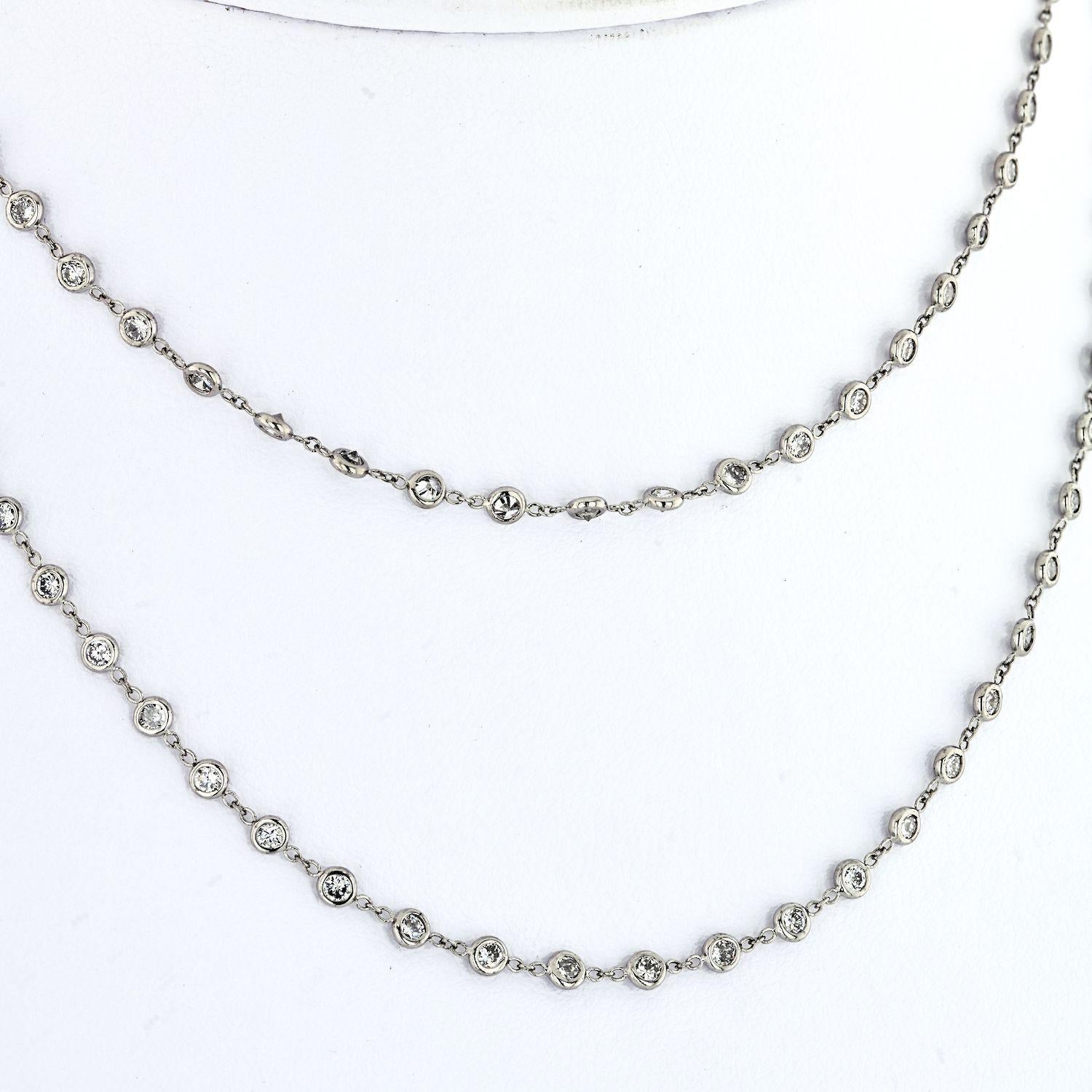 Platinum 5 carat Round Cut Diamonds by the Yard Necklace mounted with 117 stones all of clean and colorless quality.