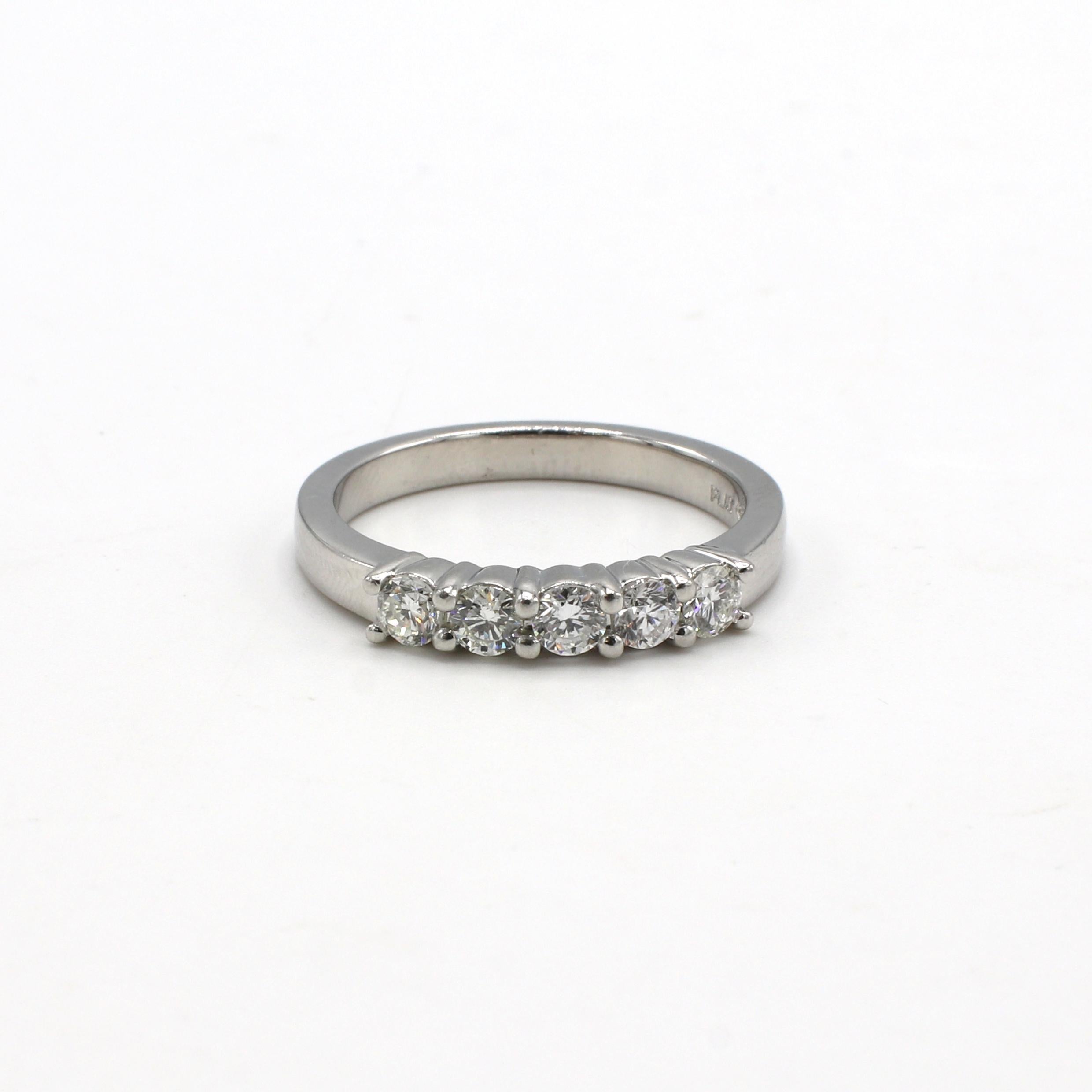 Platinum .50 Carat 5 Stone Diamond Wedding Band Ring 
Metal: Platinum
Weight: 5.73 grams
Diamonds: Approx. .50 CTW round G-H VS diamonds
Size: 7 (US)
Width: 2.5mm
