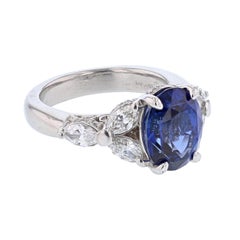 Platinum 5.01 Carat Certified Oval Cut Sri Lankan Blue Sapphire and Diamond Ring