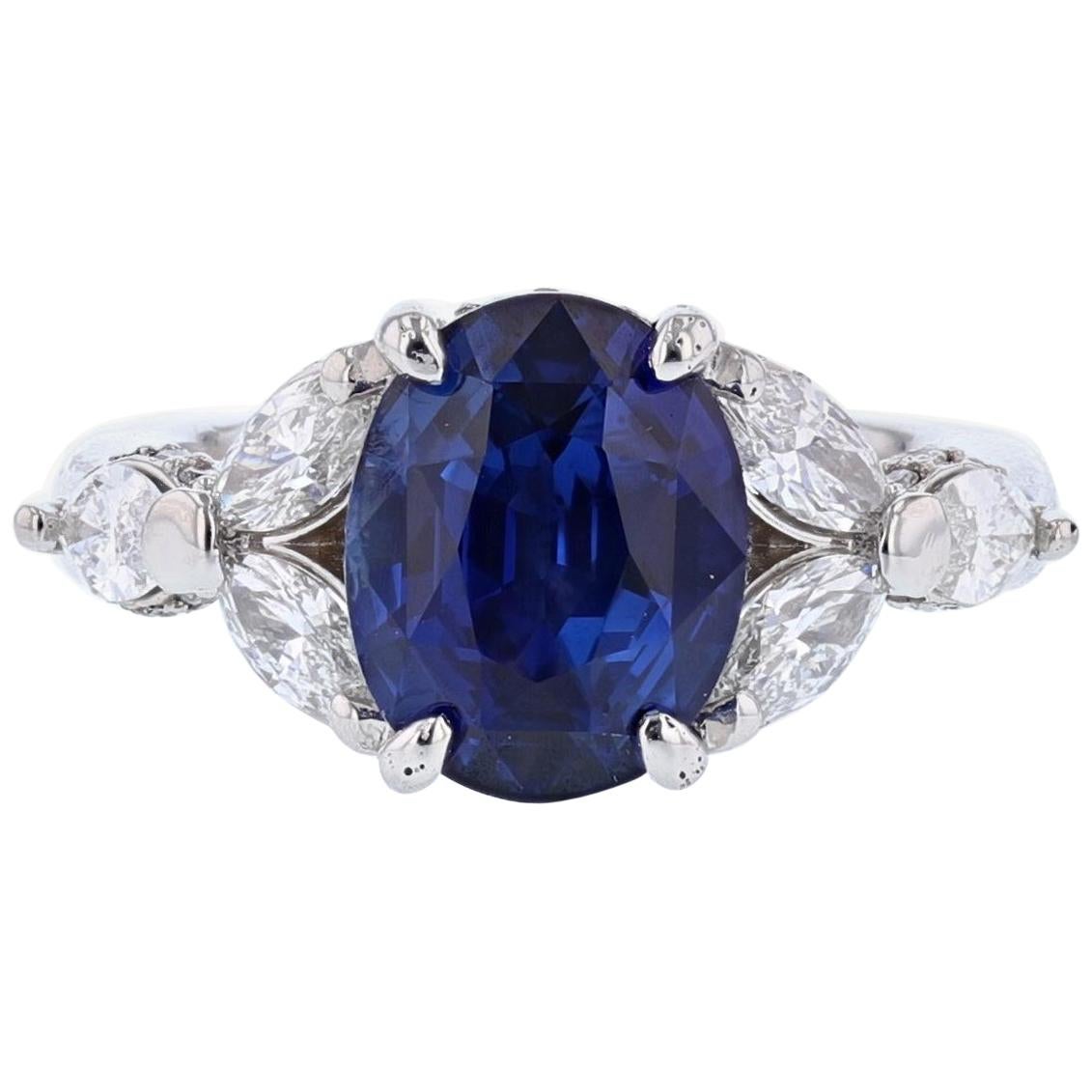 Platinum 5.01 Carat Certified Oval Cut Sri Lankan Blue Sapphire and Diamond Ring For Sale