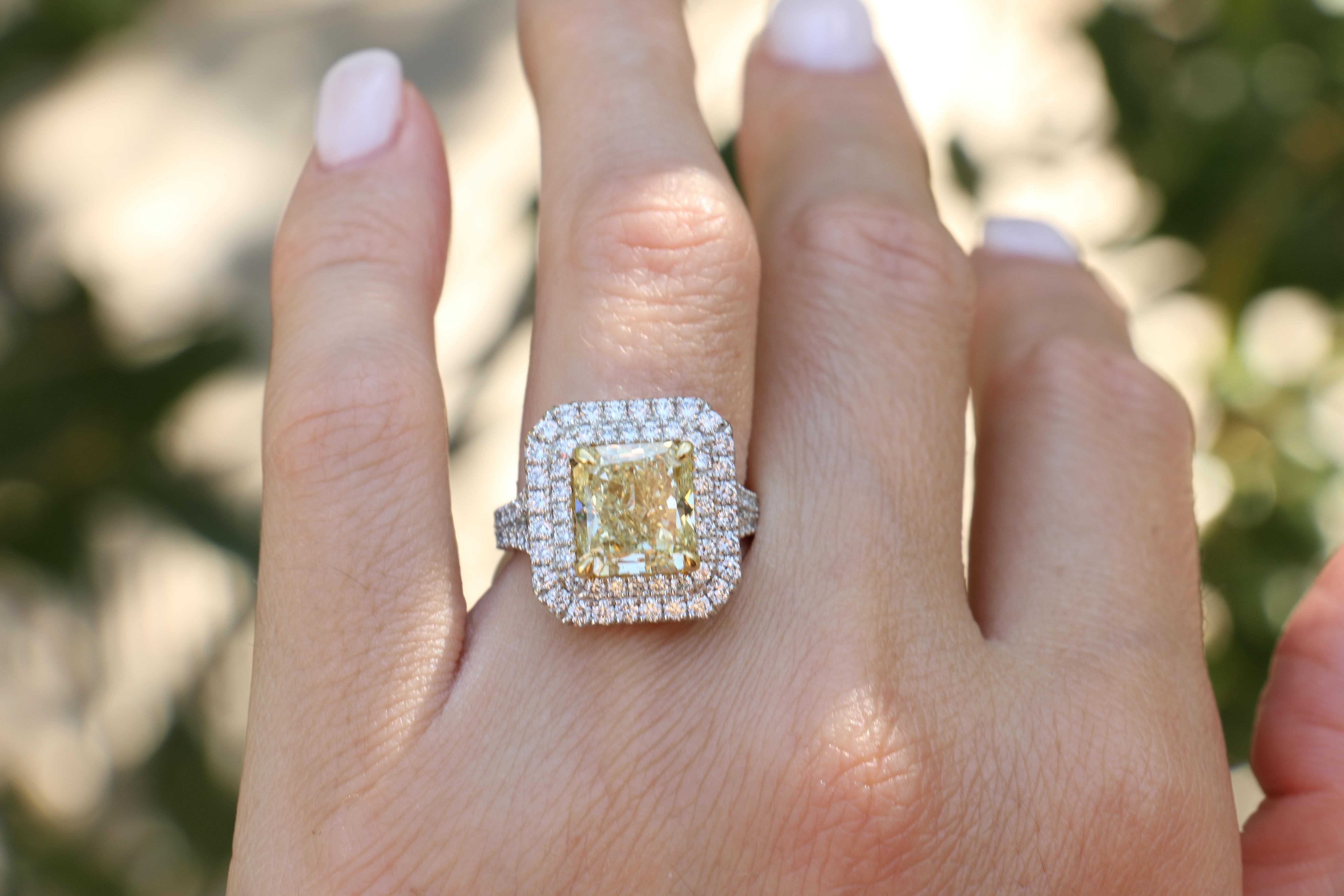 5.03 Carat Fancy Yellow Diamond GIA Certified Halo Ring Platinum  In New Condition For Sale In Houston, TX