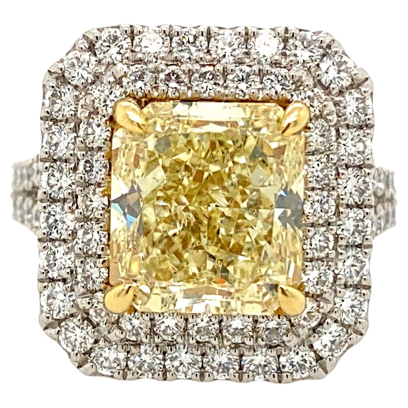 Bague halo en platine avec diamant jaune fantaisie de 5,03 carats certifié GIA 