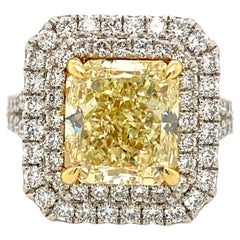 Platinum 5.03 Carat Fancy Yellow Diamond GIA Certified Halo Ring