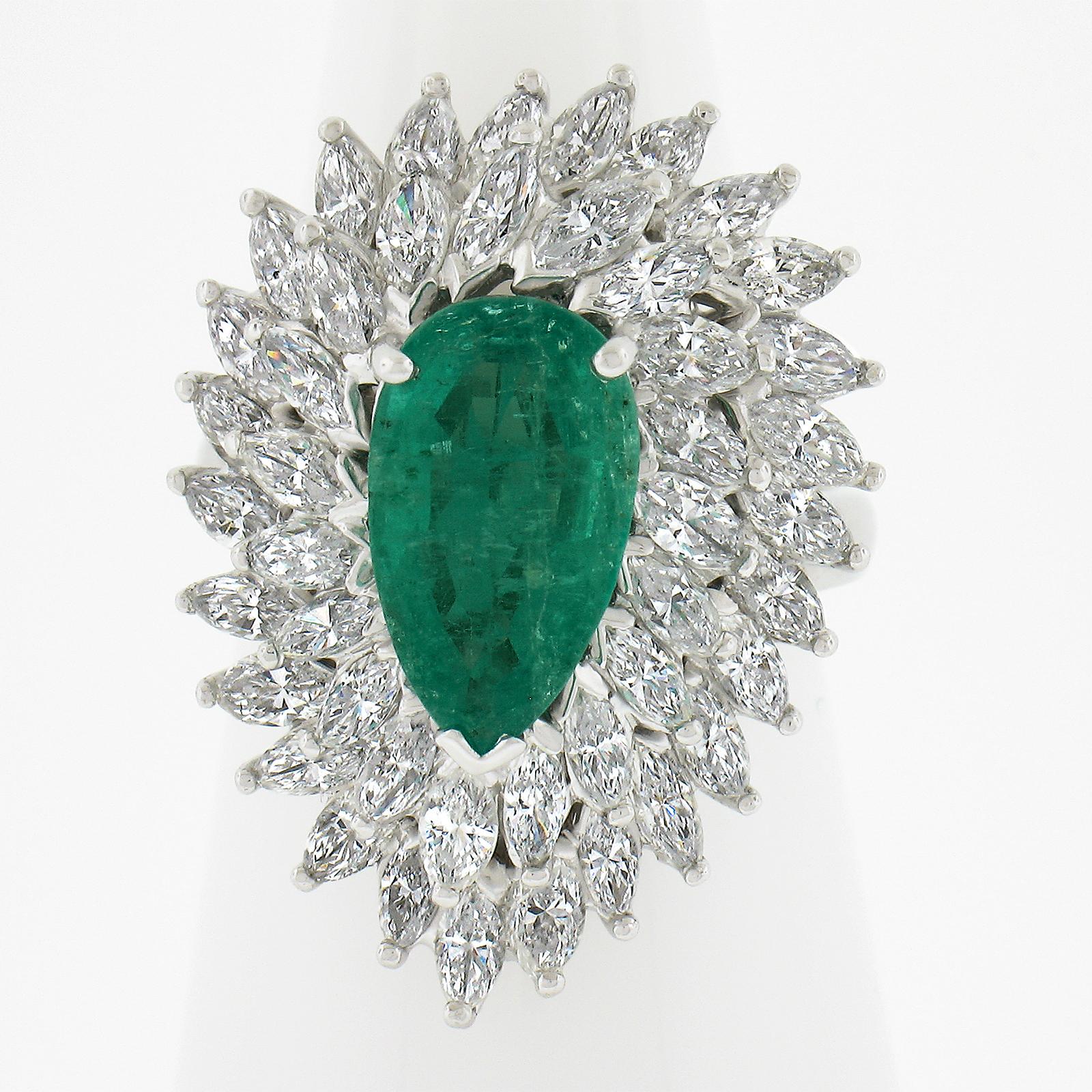 --Stone(s):--
(1) Natural Genuine Emerald - Elongated Pear Cut - Prong Set - Green Color - Clarity Enhanced (F2) - 2.07ct (exact - certified)
** See Certification Details Below for Complete Info **
(45) Natural Genuine Diamonds - Marquise Cut -