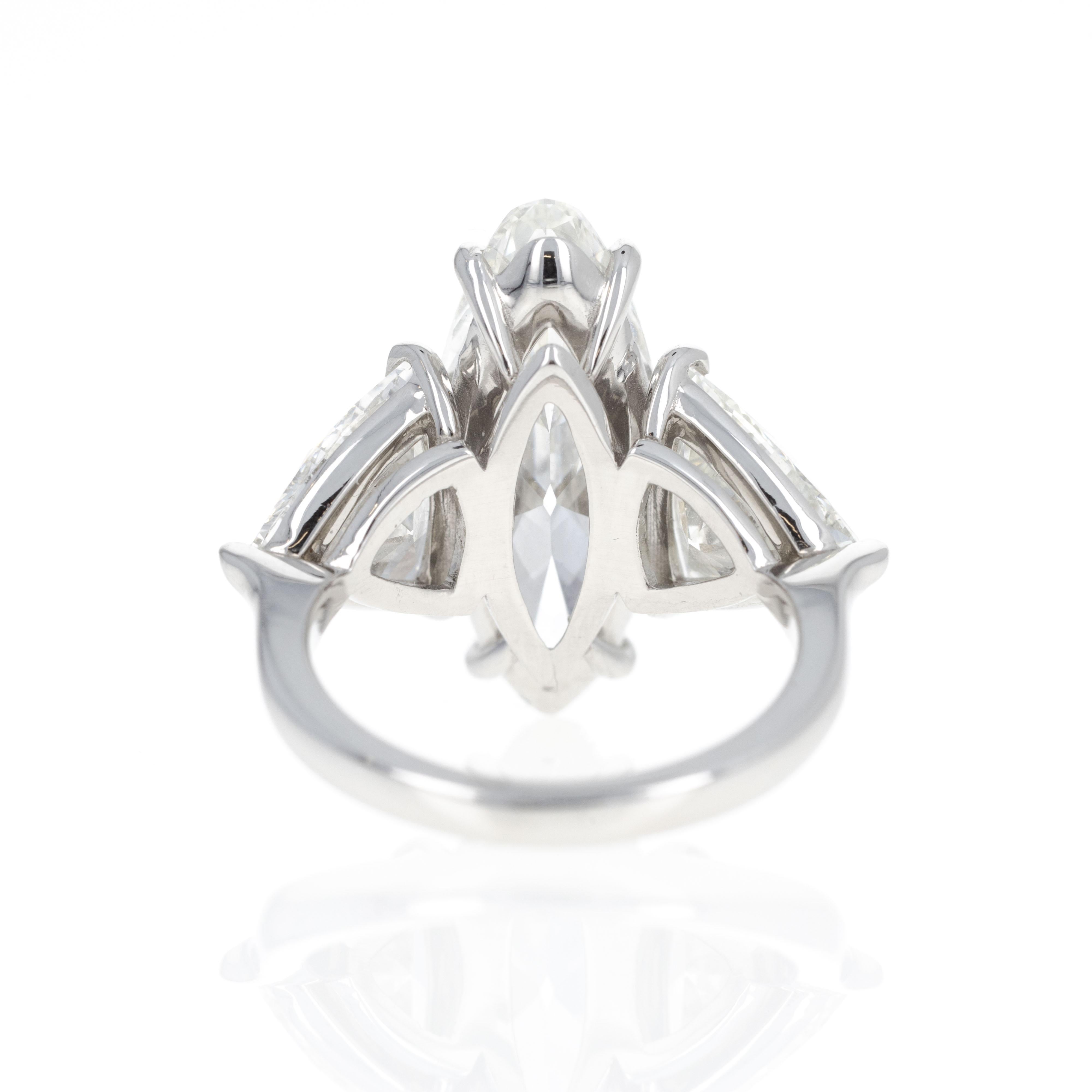 Women's Platinum 5.16 Carat Moval Diamond Three Stone Engagement Ring For Sale