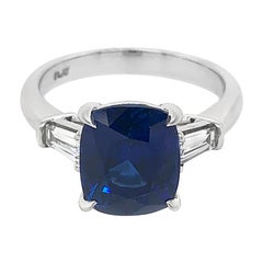 Platinum 5.18 Carat Cushion Blue Sapphire 0.38 Carat Tapered Baguette Ring