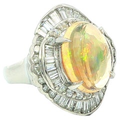 Platinum 5.19ctw Oval Colorful Fiery Jelly Opal w/ Baguette Diamond Ring