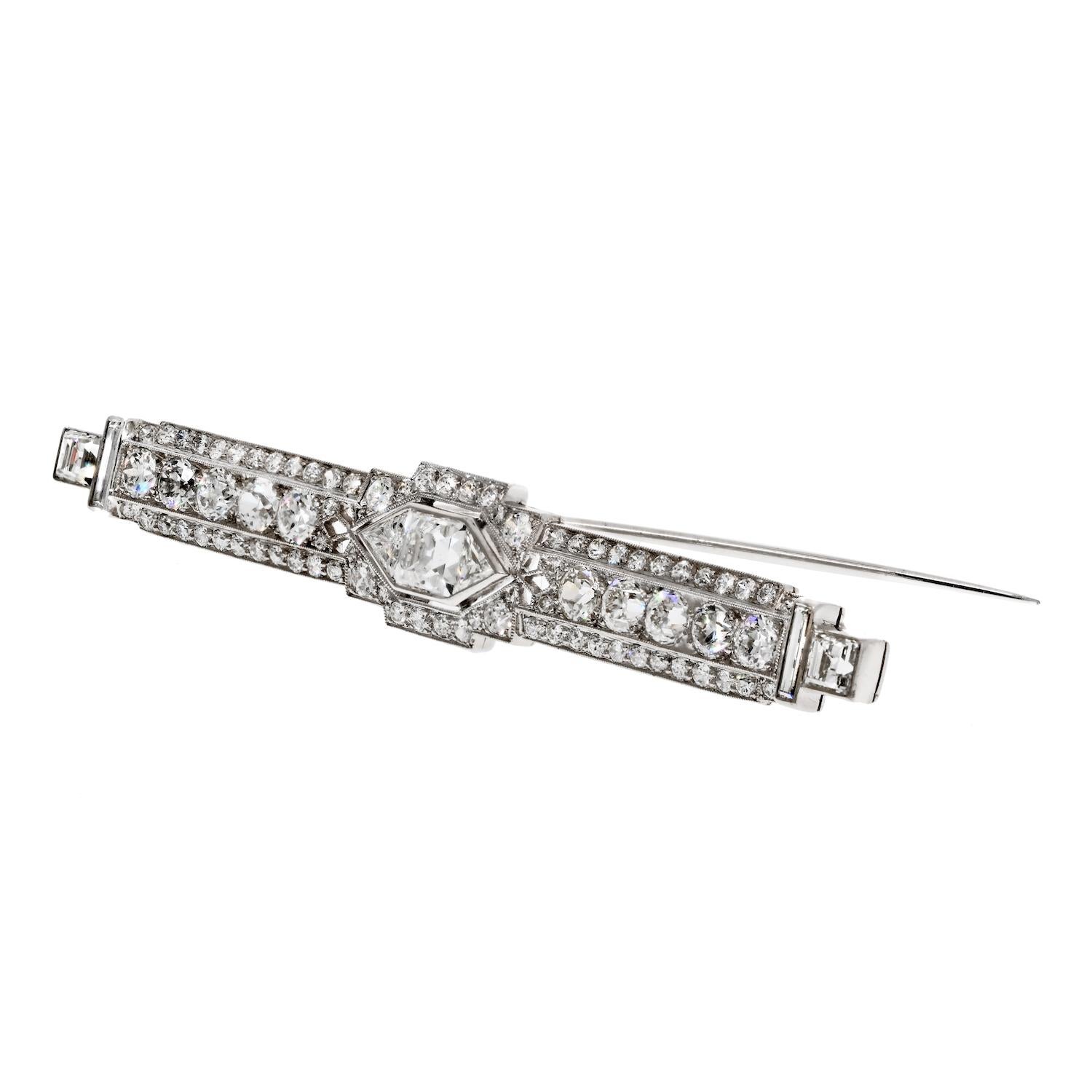 The Art Deco platinum brooch is a stunning piece of jewelry that showcases the exquisite artistry and design of the Art Deco era. This brooch is made with old cut diamonds, with an asscher cut diamond in the center and on the ends, creating a