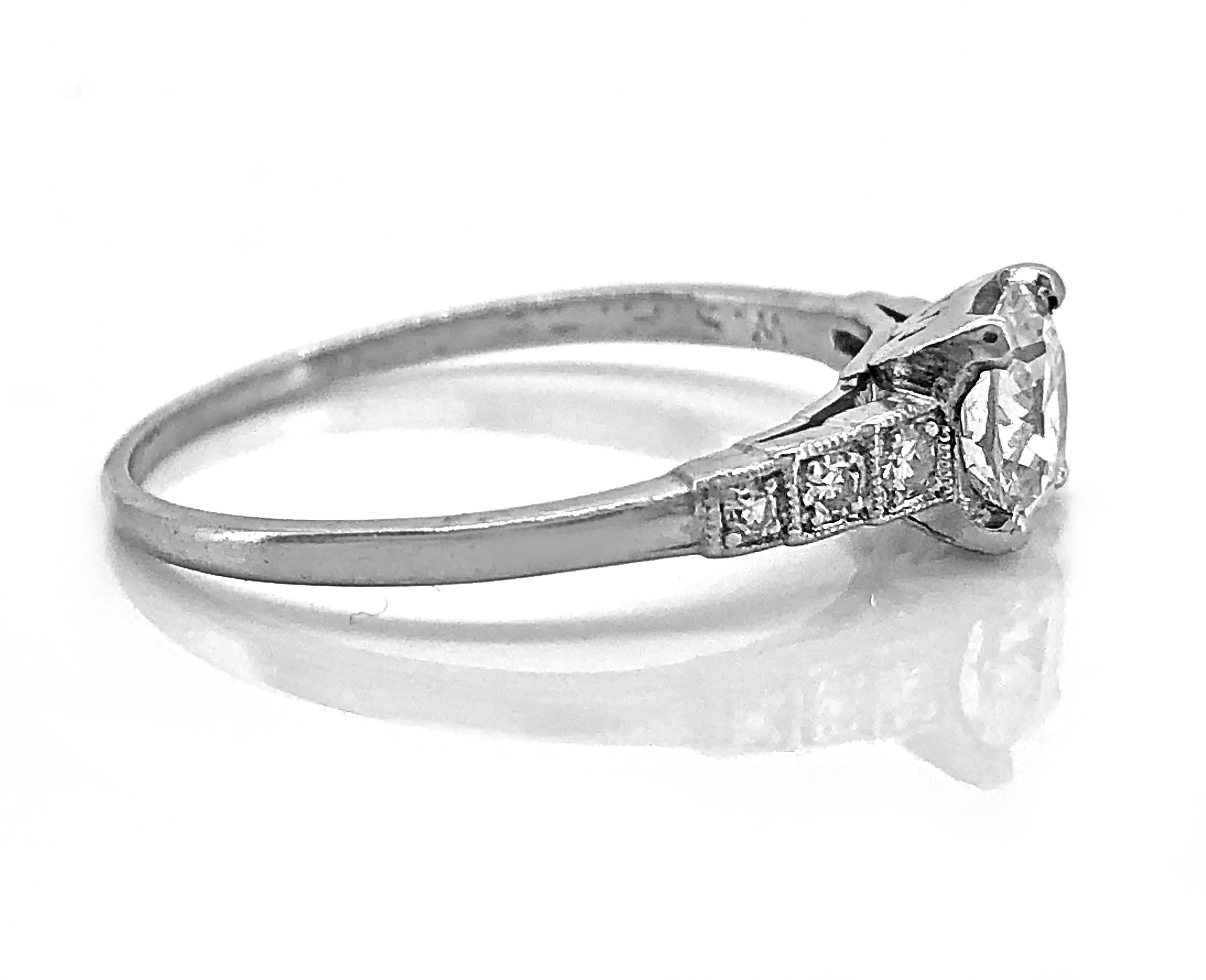 A stunning Art Deco Diamond & Platinum Antique Engagement Ring. It features a .53ct. European cut diamond with H-I color and VS1 clarity. It is accompanied with .06ct. T.W. apx. of sparkling single cut diamonds. This is a more traditional engagement