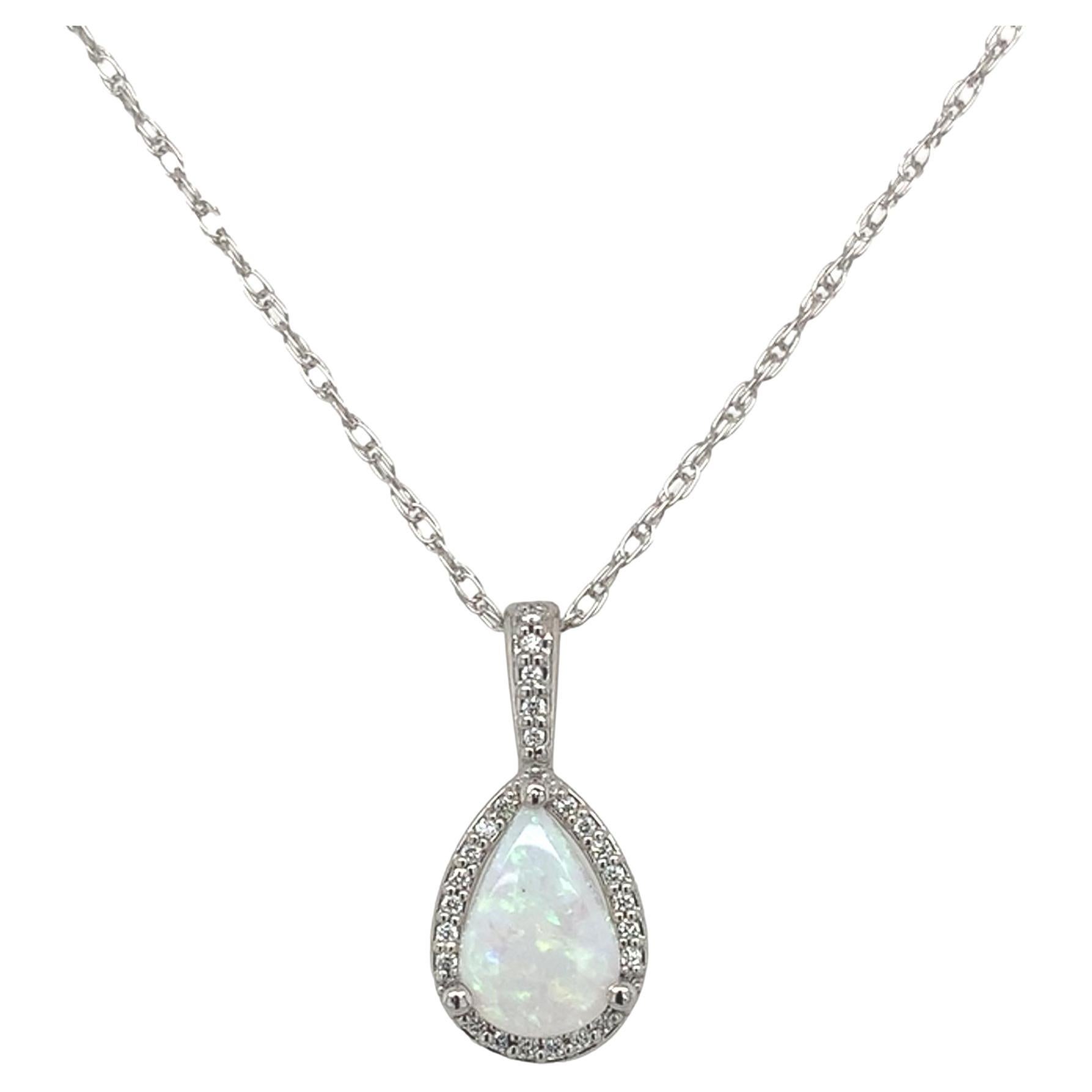 Platinum .54ct Australian Opal and Diamond Halo Pendant with 18" platinum chain