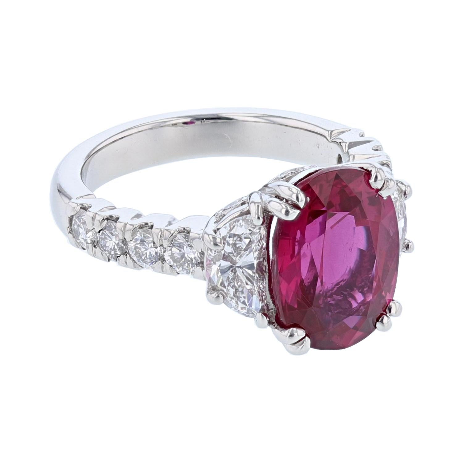 This ring is made in Platinum and features an Oval cut, Natural Mozambique Ruby weighing 5.61ct with a GRS certificate. The certificate number is 