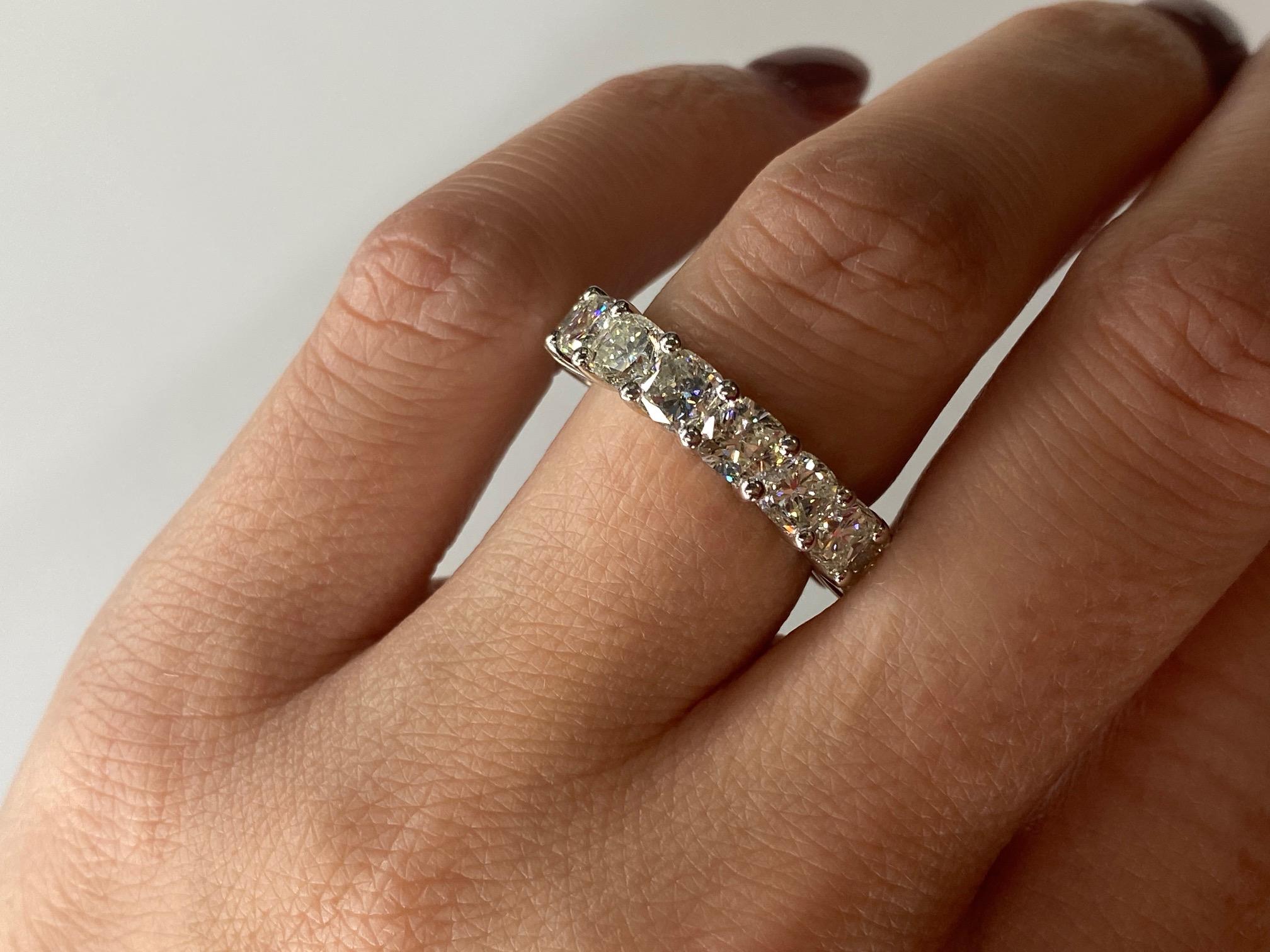 Platinum 6.00 Carat Cushion Cuts Diamond Eternity Band In Excellent Condition For Sale In New York, NY