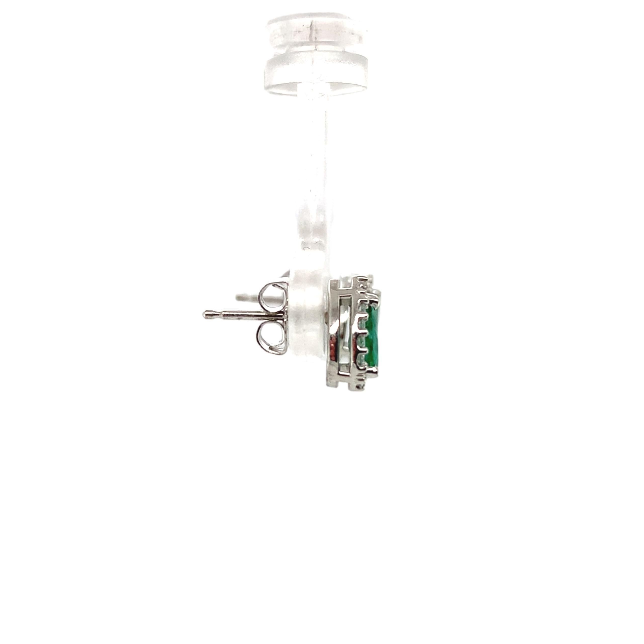 Pear Cut Platinum .60ct tw Emerald and Diamond Halo Stud Earrings For Sale