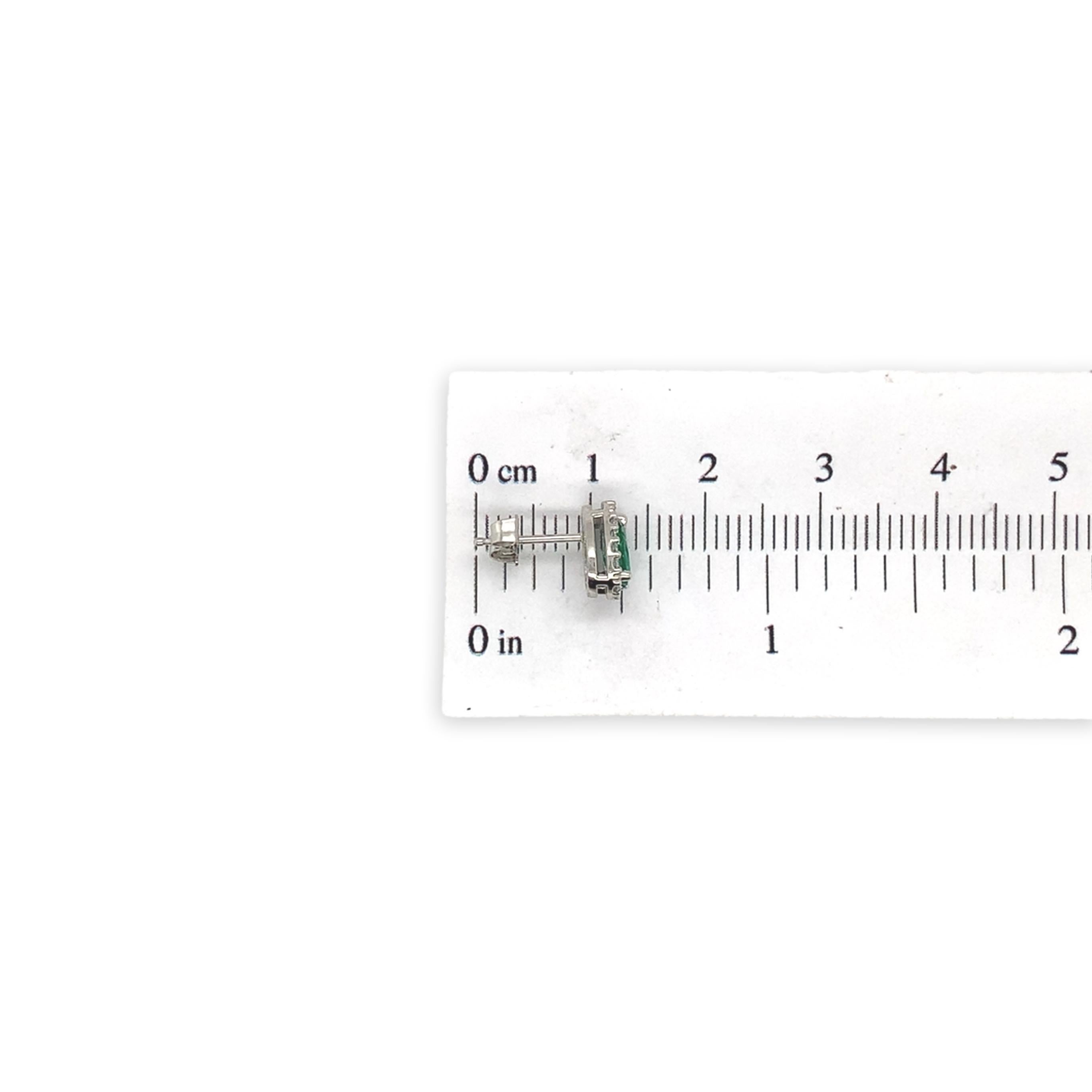 Women's or Men's Platinum .60ct tw Emerald and Diamond Halo Stud Earrings For Sale