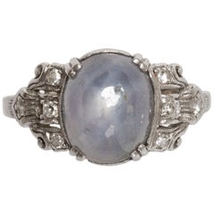 Antique Platinum 6.3 Carat Star Sapphire and Diamond Ring