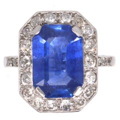 Platinum 6.6 Carats Ceylon Sapphire & Diamond Cluster Ring, Early 20th Century
