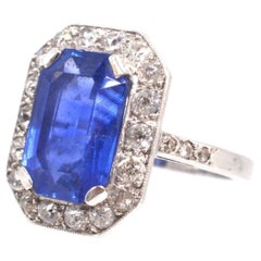Platinum 6.6 Carats Ceylon Sapphire & Diamond Cluster Ring, Early 20th Century