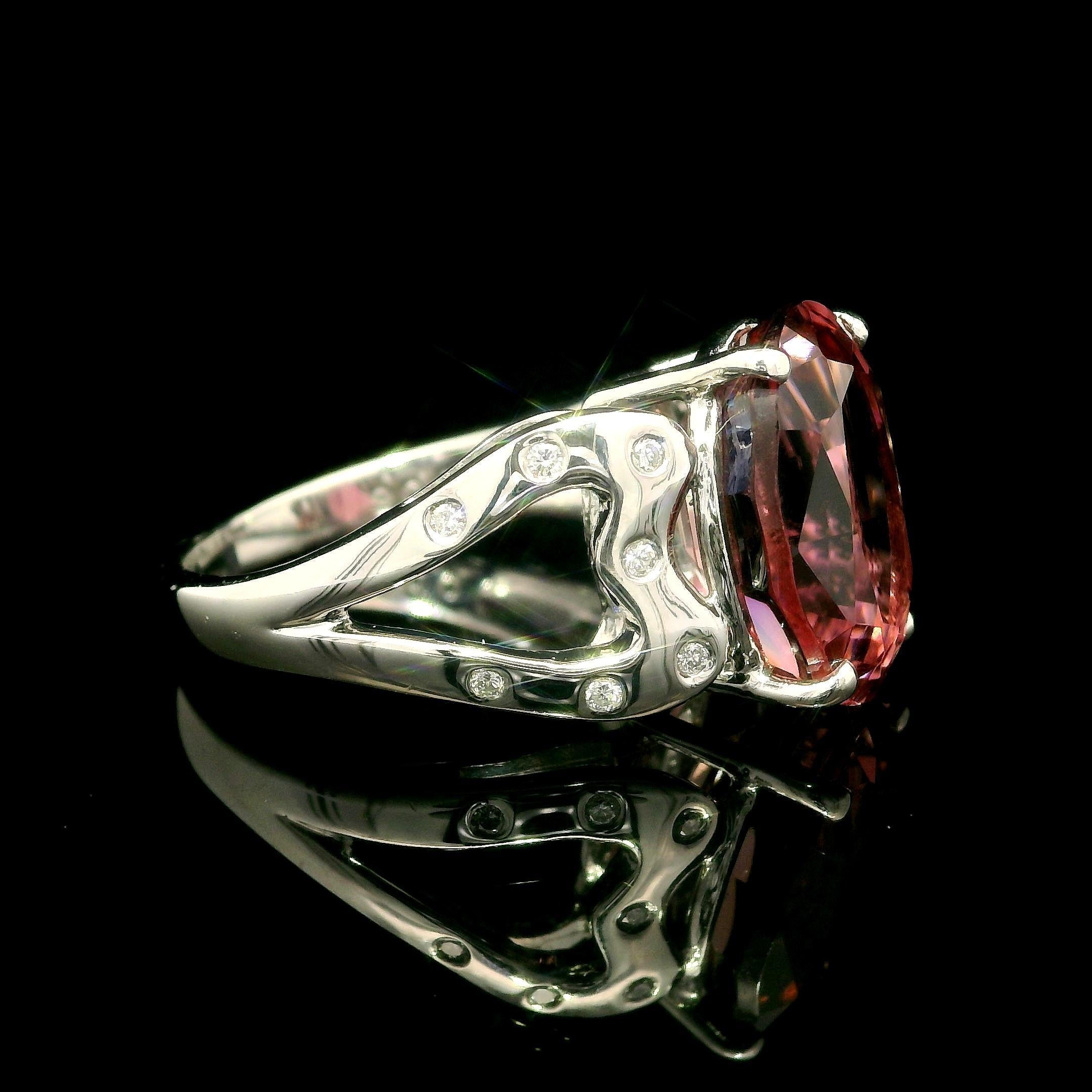 --Stone(s):--
(1) Natural Genuine Tourmaline - Oval Brilliant Cut - Prong Set - Pink Color - 13.4x9.6mm - 6.62ct (exact)
(14) Natural Genuine Diamonds - Round Brilliant Cut - Burnish Set - Nice White Color - 0.08ctw (exact)
Total Carat Weight: 6.70