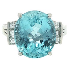 Platinum 6.92ctw Oval Aquamarine & Carre Step Cut Diamond Sides Ring