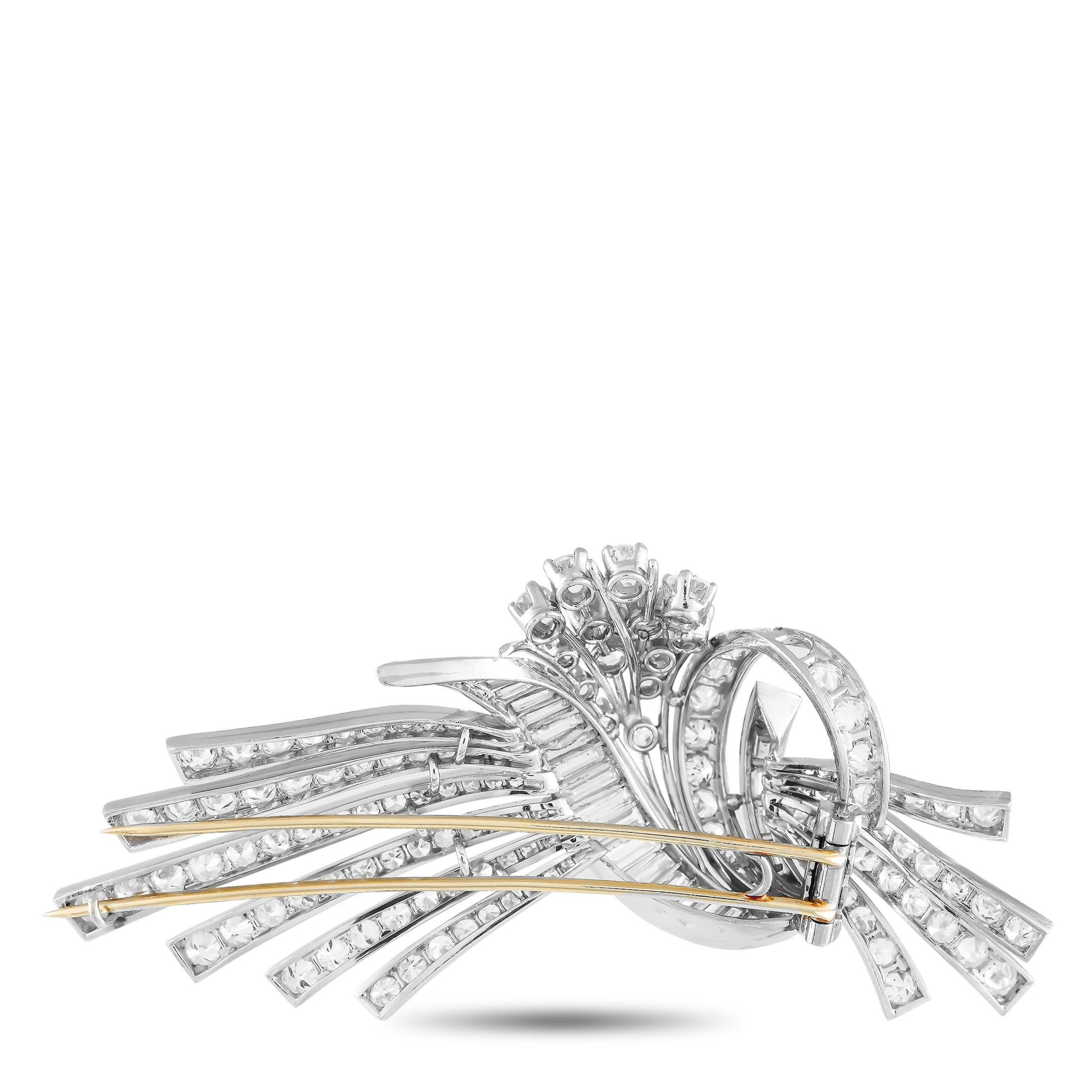 Refine your style with this platinum brooch. Fashioned in noble platinum, this brooch features an elegant design reminiscent of a hand-tied gathering of twigs and wildflowers. There is a cluster of round diamonds, a swirling ribbon of round and