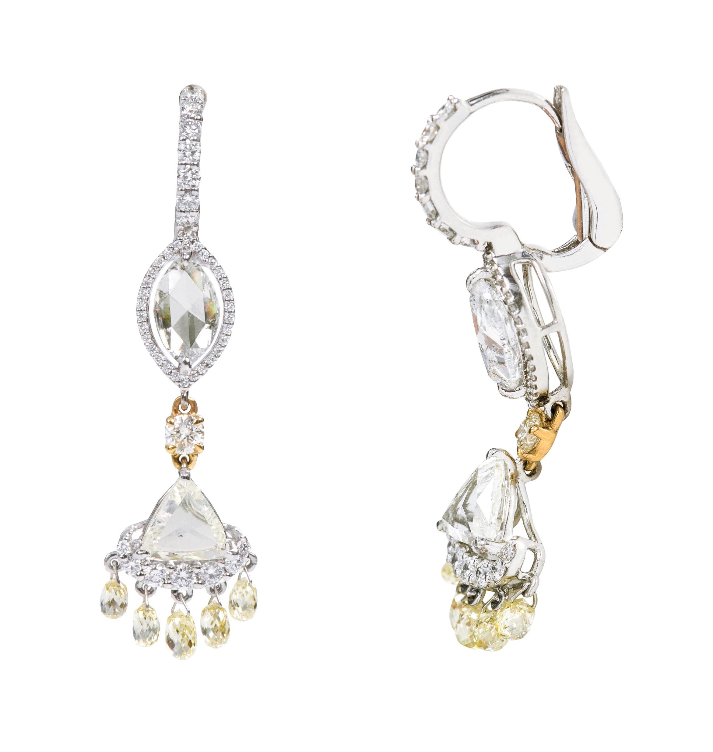 Platinum 6.96 Carat Diamond Lever-Back Drop Earrings 

This exquisite diamond long-hanging earring is divine. The bottom trapezoid rose cut solitaire diamond is enhanced with a half-moon-shaped pave set round diamond cluster attached with beautiful