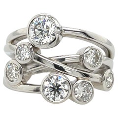 Anello in platino con 7 pietre e diamanti, con 1,63 carati di diamanti rotondi taglio Brilliante