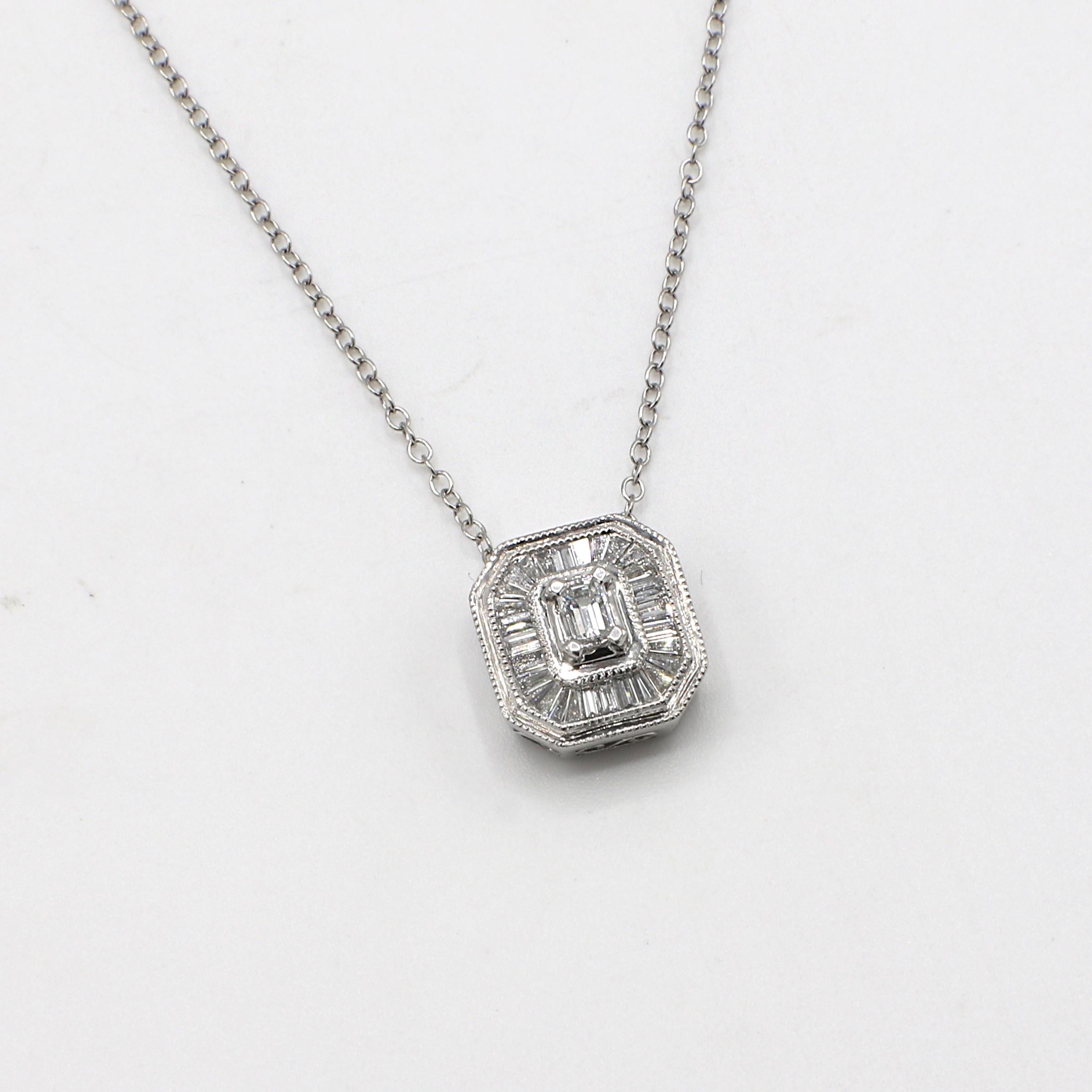 Platinum .75 Carat Diamond Baguette Cluster Pendant Drop Necklace 
Metal: Platinum
Weight: 5.11 grams
Pendant: 11.5 x 10.5mm
Chain: 18 inches
Diamonds: Approx. .75 CTW baguette diamonds G-H VS
