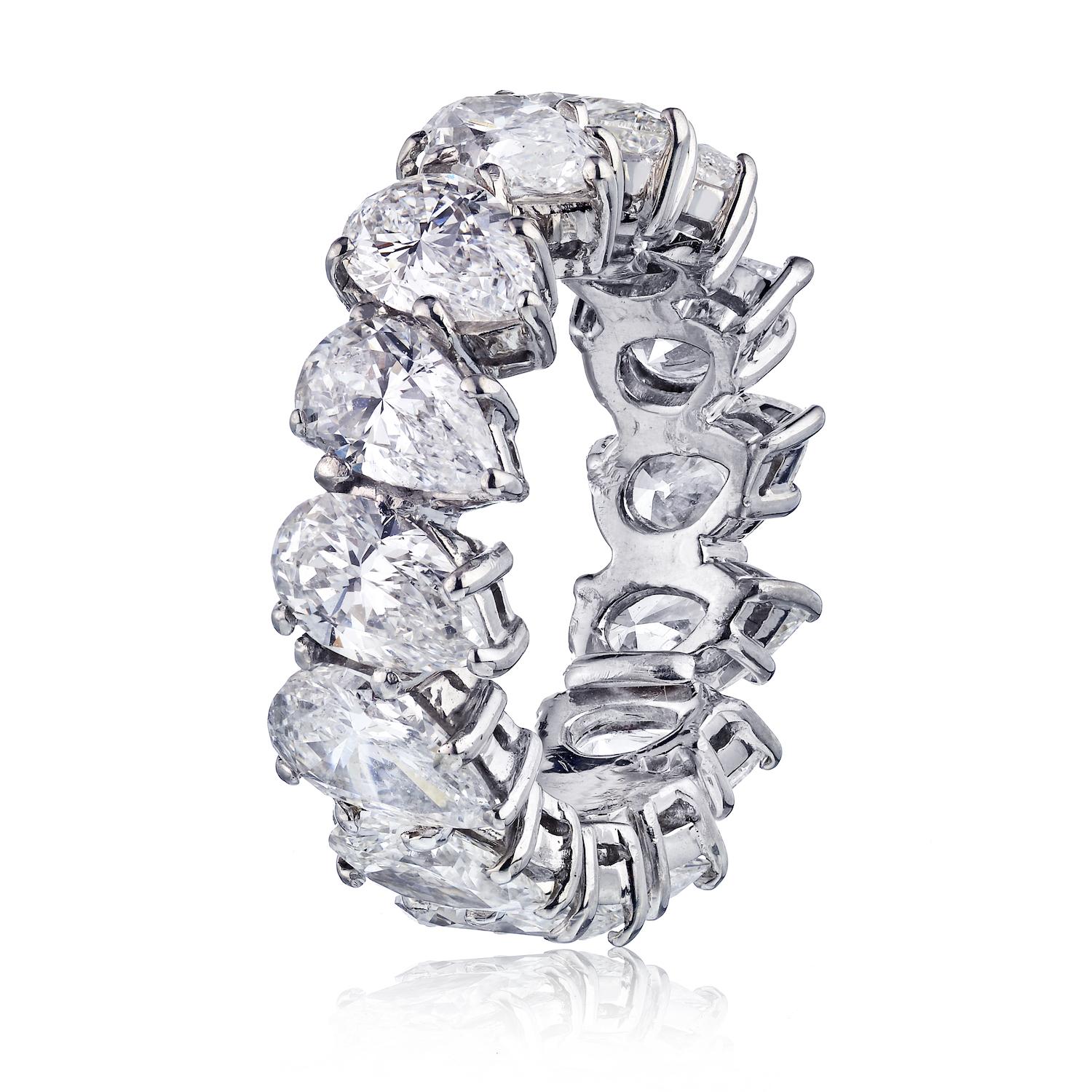 Made in platinum this beautiful ring is mounted with very special all matching pear-cut diamonds of 7.50 carats in total. Stunning ring for someone who wants to leave an engagement ring at home and yet stop the show with this one ring. 
Celebrate a