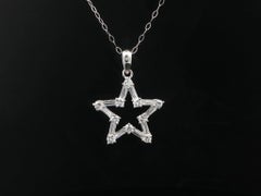 Platinum .75ctw Round & Baguette Diamond Framed Open Star Pendant 18" Chain